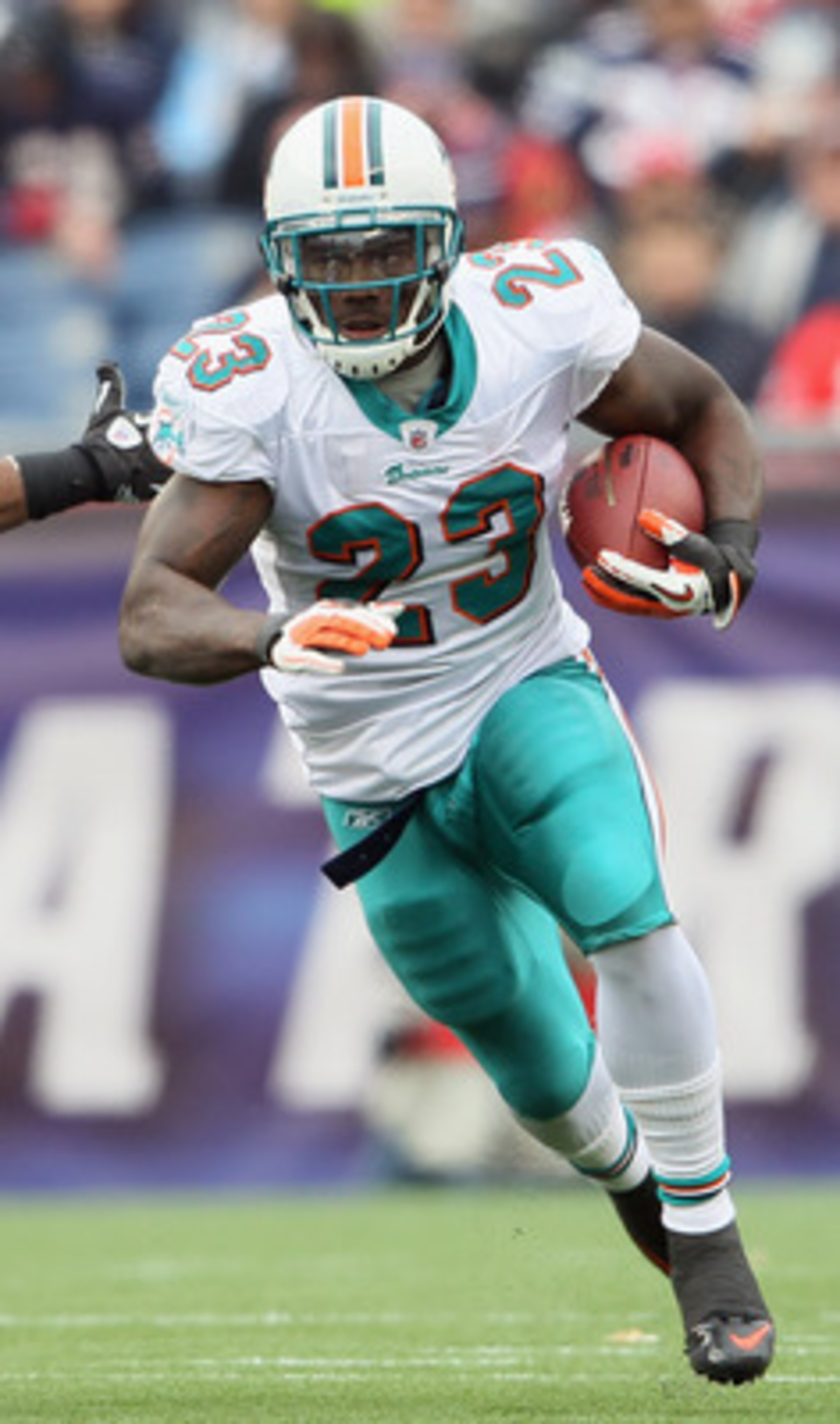 FOXBORO, MA - JANUARY 02: Ronnie Brown #23 of the Miami Dolphins carries the ball in the first half against the New England Patriots on January 2, 2011 at Gillette Stadium in Foxboro, Massachusetts. (Photo by Elsa/Getty Images) FOXBORO, MA - JANUARY 02: Ronnie Brown #23 of the Miami Dolphins carries the ball in the first half against the New England Patriots on January 2, 2011 at Gillette Stadium in Foxboro, Massachusetts. (Photo by Elsa/Getty Images)