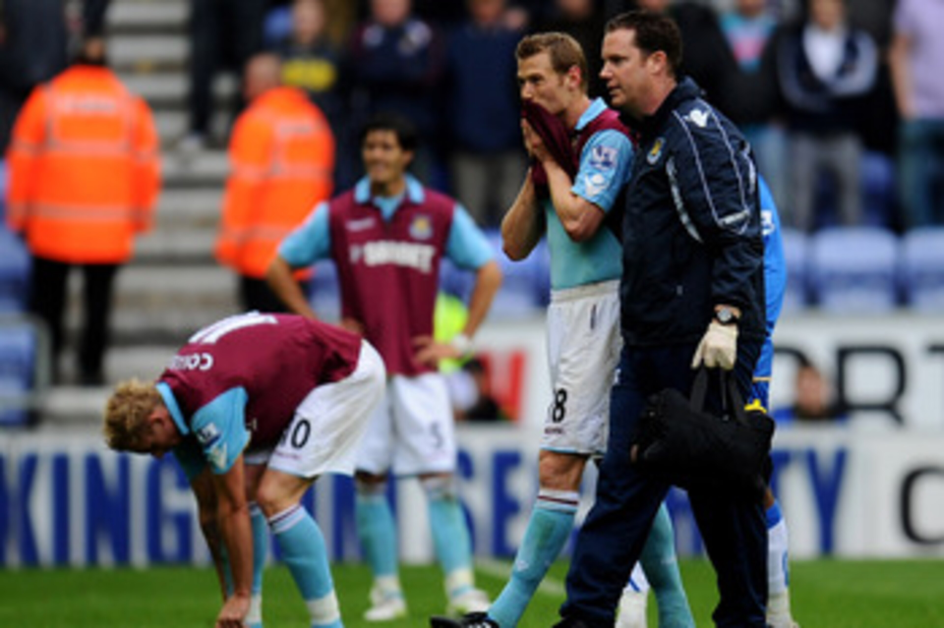 WIGAN, ENGLAND - MAY 15:  Jonathan Spector of West Ham United looks dejected following his team's relegation at the end of the Barclays Premier League match between Wigan Athletic and West Ham United at the DW Stadium on May 15, 2011 in Wigan, England.  (