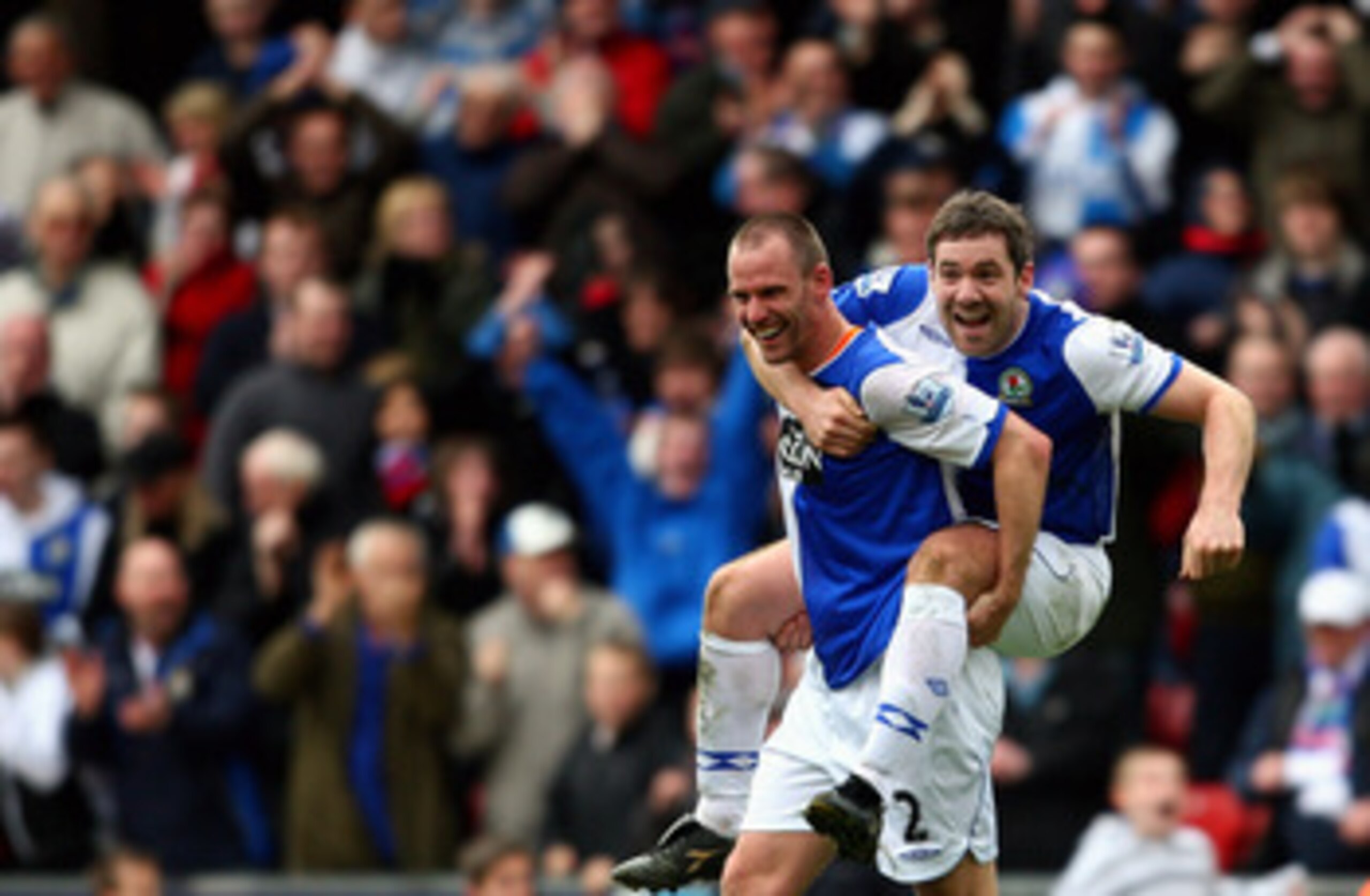 BLACKBURN, UNITED KINGDOM - APRIL 04:  Andre Ooijer of Blackburn Rovers celebrates his team's winning goal with David Dunn during the Barclays Premier League match between Blackburn Rovers and Tottenham Hotspur at Ewood Park on April 4, 2009 in Blackburn,