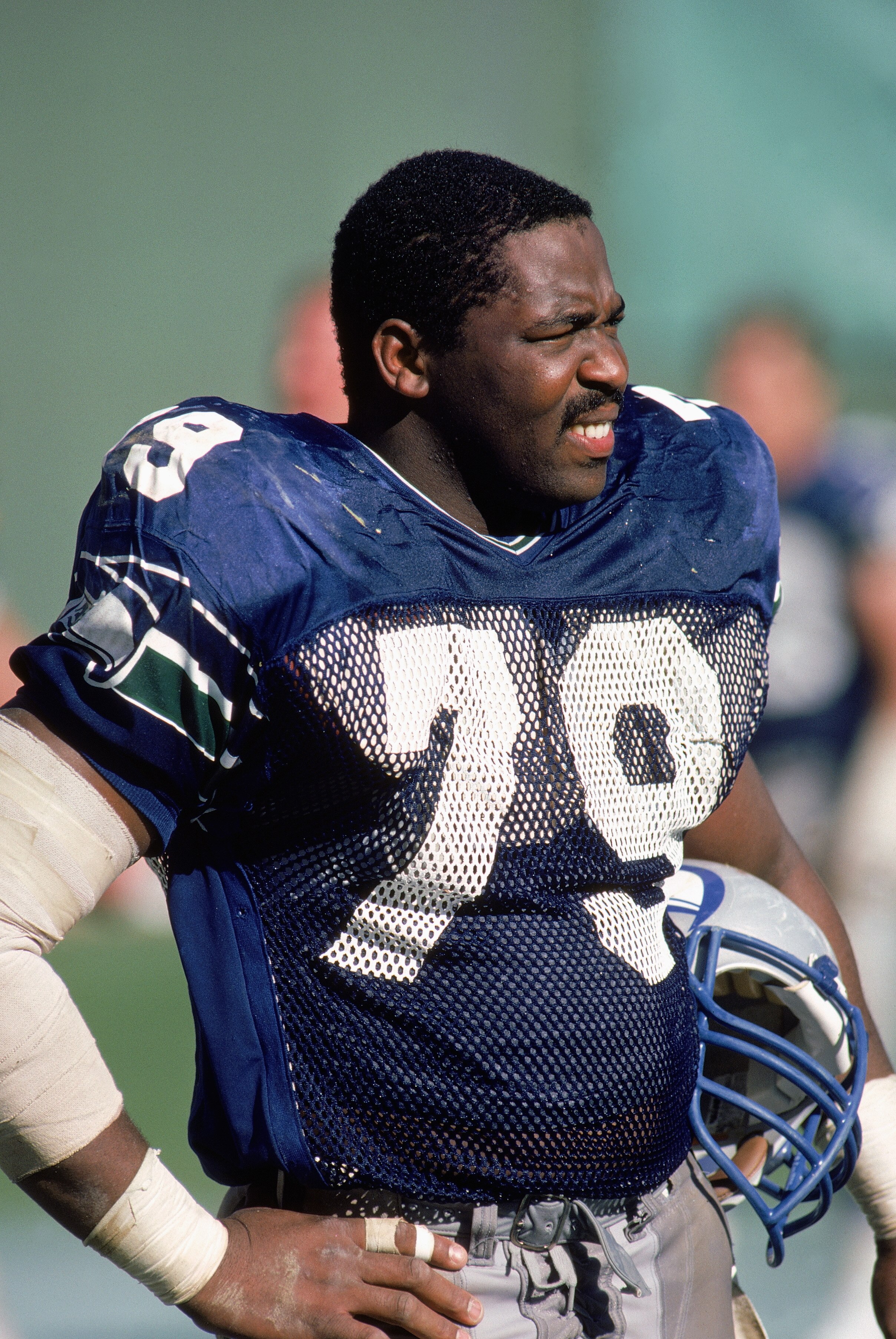 1985:  Defensive end Jacob Green #79 of the Seattle Seahawks watches the action from the sideline during a 1985 NFL game. (Photo by Rick Stewart/Getty Images)