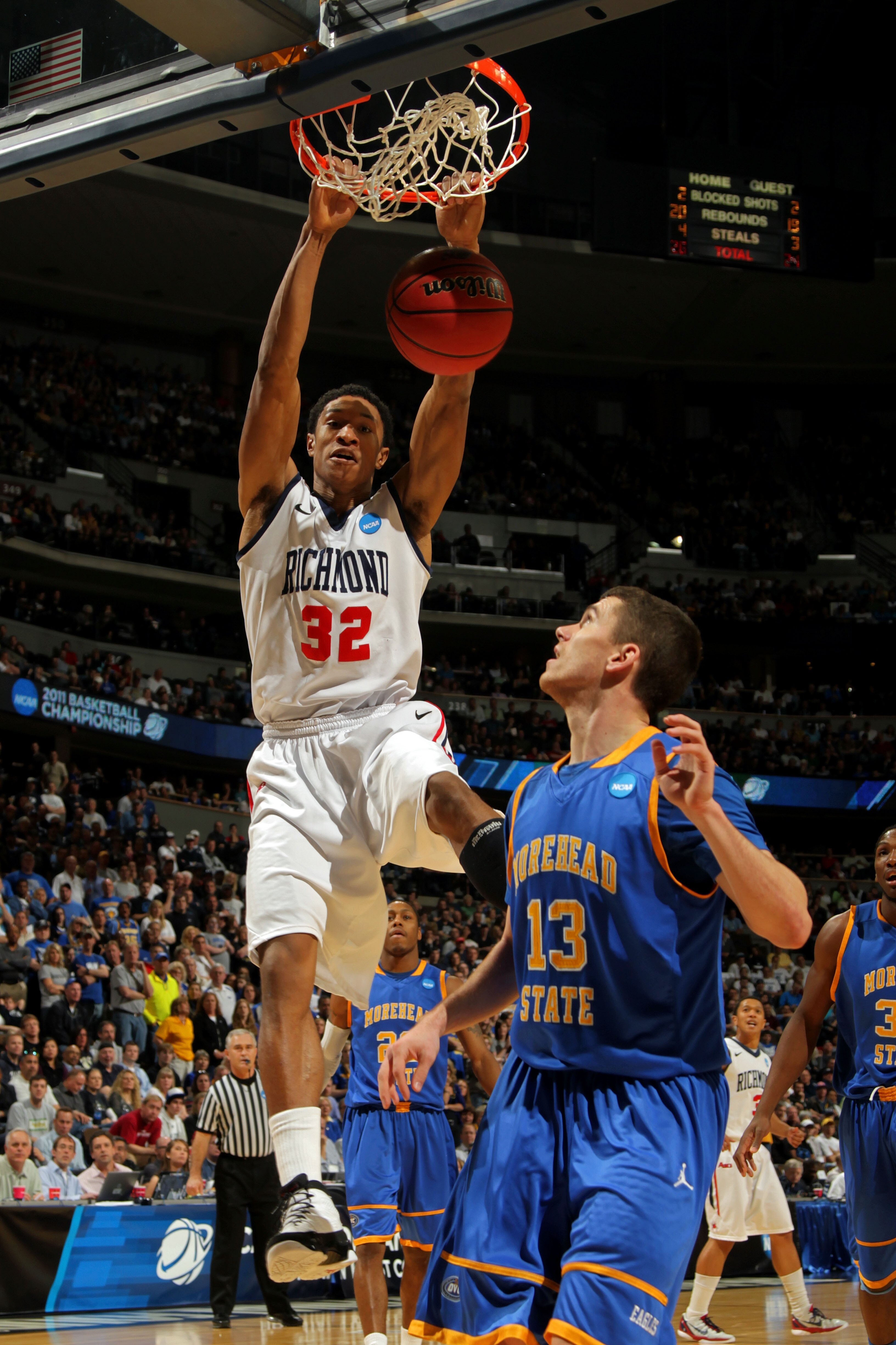 DENVER, CO - MARCH 19: Justin Harper #32 of the Richmond Spiders dunks the ball against Ty Proffitt #13 of the Morehead State Eagles during the third round of the 2011 NCAA men's basketball tournament at Pepsi Center on March 19, 2011 in Denver, Colorado DENVER, CO - MARCH 19: Justin Harper #32 of the Richmond Spiders dunks the ball against Ty Proffitt #13 of the Morehead State Eagles during the third round of the 2011 NCAA men's basketball tournament at Pepsi Center on March 19, 2011 in Denver, Colorado