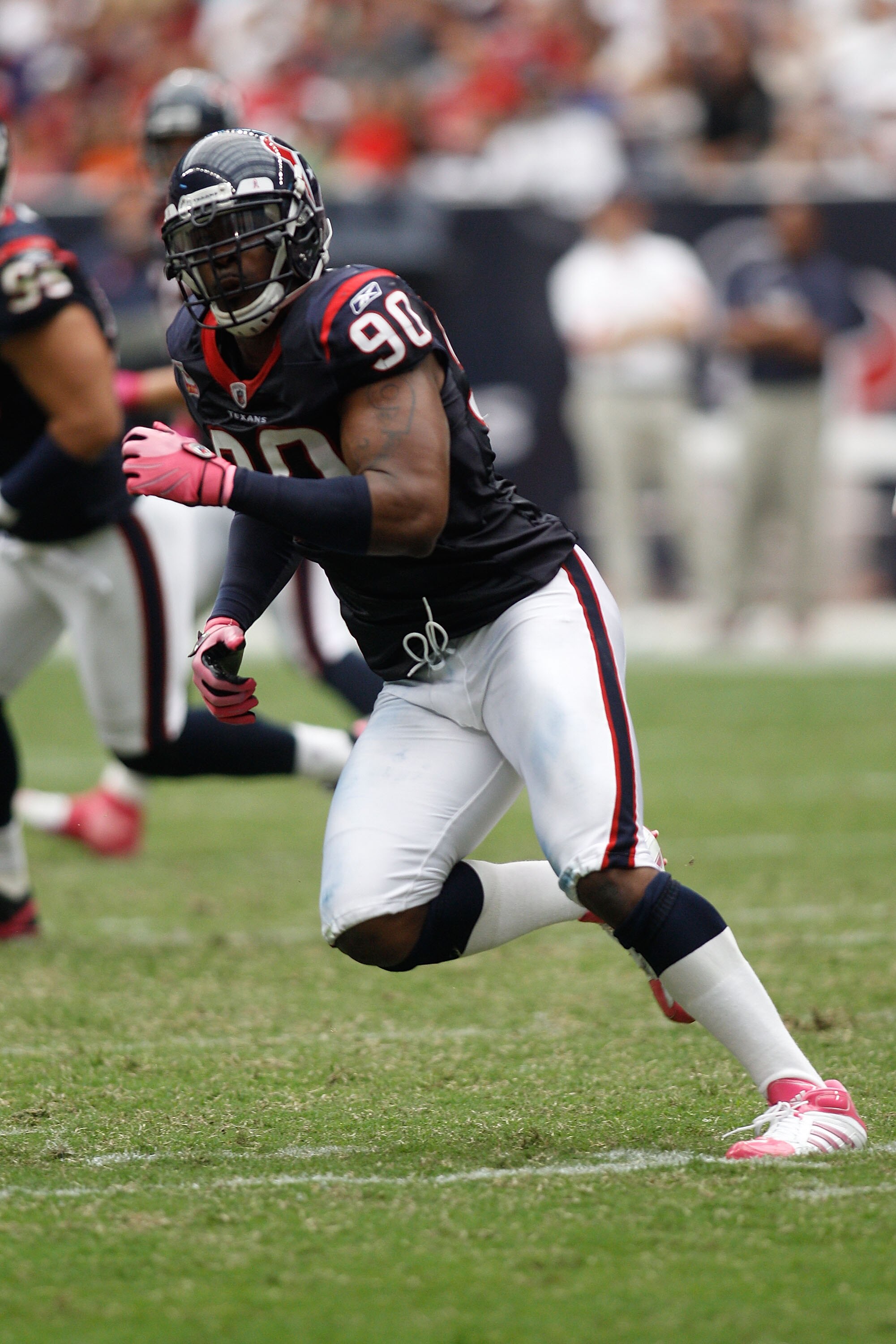 HOUSTON - OCTOBER 10:  Mario Williams #90 of the Houston Texans in action during the game against the New York Giants at Reliant Stadium on October 10, 2010 in Houston, Texas.  (Photo by Chris Graythen/Getty Images)