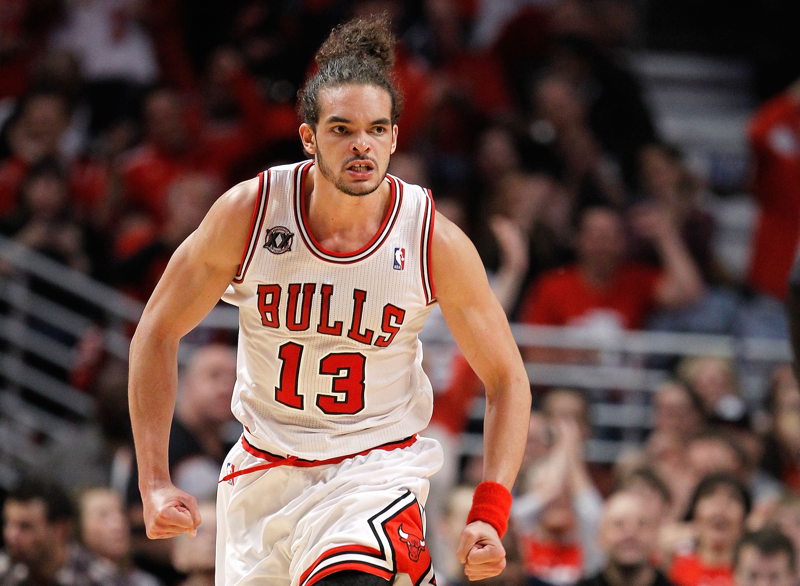 CHICAGO, IL - MAY 15:  Joakim Noah #13 of the Chicago Bulls reacts against the Miami Heat in Game One of the Eastern Conference Finals during the 2011 NBA Playoffs on May 15, 2011 at the United Center in Chicago, Illinois. NOTE TO USER: User expressly ack