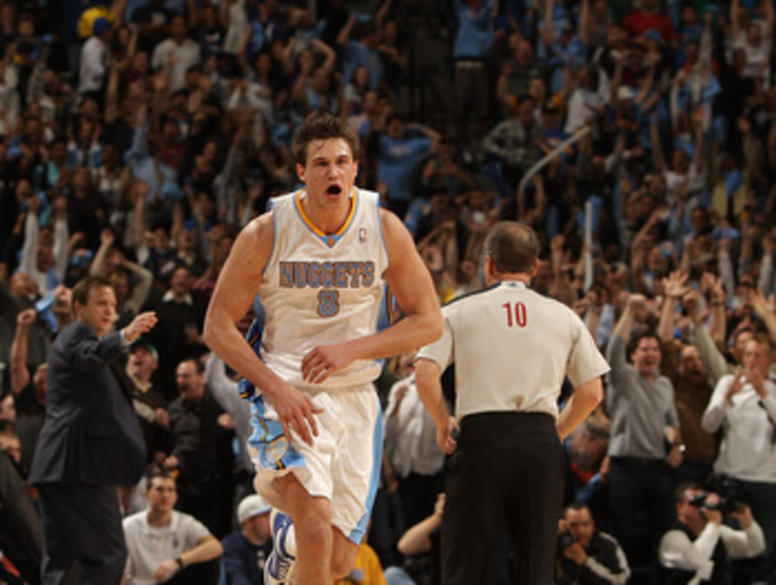 DENVER, CO - APRIL 25:  Danilo Gallinari #8 of the Denver Nuggets celebrates after hitting a three point basket against the Oklahoma City Thunder during the fourth quarter in Game Four of the Western Conference Quarterfinals in the 2011 NBA Playoffs at Pe