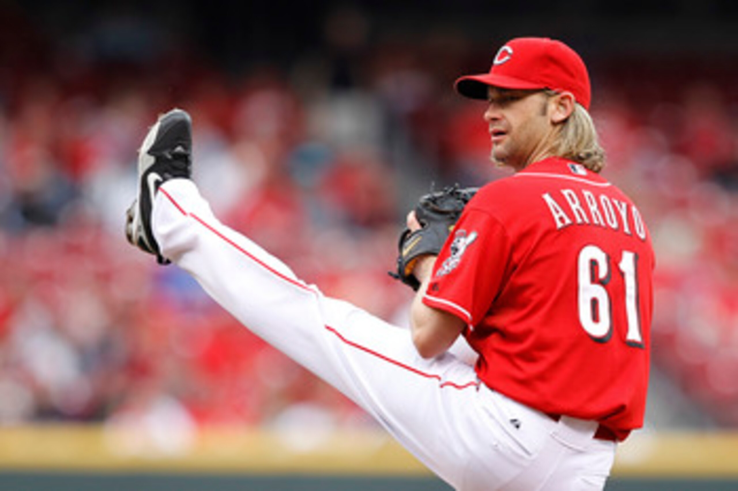 CINCINNATI, OH - MAY 1: Bronson Arroyo #61 of the Cincinnati Reds pitches against the Florida Marlins at Great American Ball Park on May 1, 2011 in Cincinnati, Ohio. The Marlins defeated the Reds 9-5. (Photo by Joe Robbins/Getty Images)