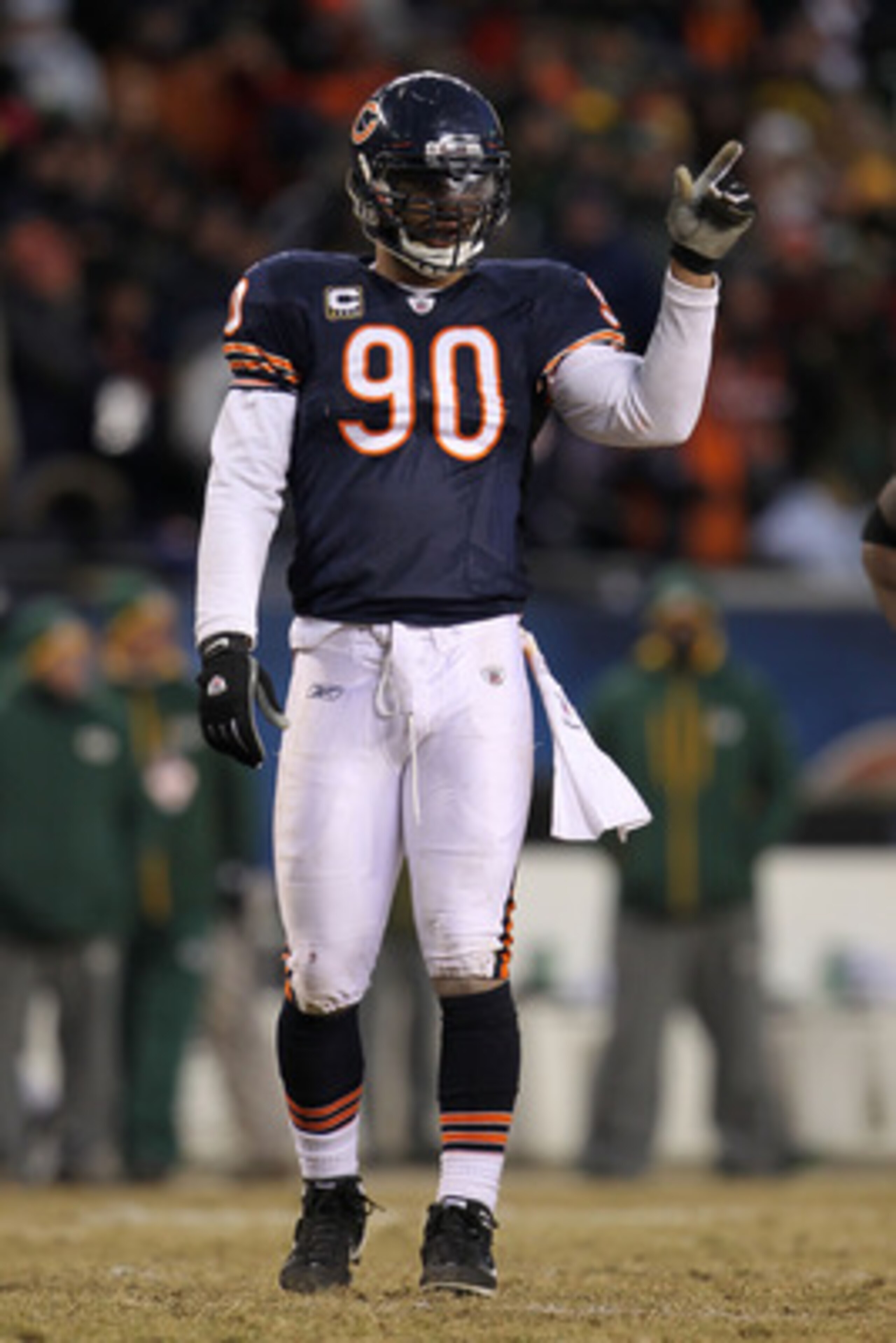 CHICAGO, IL - JANUARY 23: Julius Peppers #90 of the Chicago Bears reacts while taking on the Green Bay Packers in the NFC Championship Game at Soldier Field on January 23, 2011 in Chicago, Illinois. (Photo by Jamie Squire/Getty Images) CHICAGO, IL - JANUARY 23: Julius Peppers #90 of the Chicago Bears reacts while taking on the Green Bay Packers in the NFC Championship Game at Soldier Field on January 23, 2011 in Chicago, Illinois. (Photo by Jamie Squire/Getty Images)