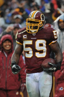 LANDOVER, MD - DECEMBER 12: London Fletcher #59 of the Washington Redskins celebrates a goalline fumble recovery against the Tampa Bay Buccaneers at FedExField on December 12, 2010 in Landover, Maryland. The Buccaneers defeated the Redskins 17-16. (Phot LANDOVER, MD - DECEMBER 12: London Fletcher #59 of the Washington Redskins celebrates a goalline fumble recovery against the Tampa Bay Buccaneers at FedExField on December 12, 2010 in Landover, Maryland. The Buccaneers defeated the Redskins 17-16. (Phot