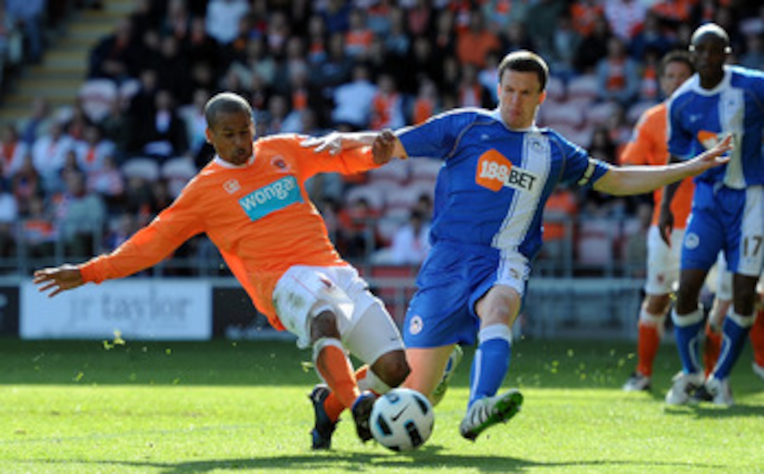 BLACKPOOL, ENGLAND - APRIL 16:  DJ Campbell of Blackpool scores his side's first goal during the Barclays Premier League match between Blackpool and Wigan Athletic at Bloomfield Road on April 16, 2011 in Blackpool, England.  (Photo by Chris Brunskill/Gett