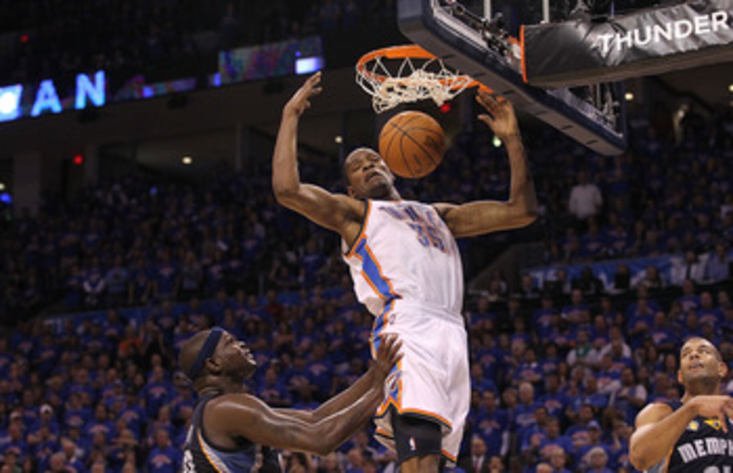 OKLAHOMA CITY, OK - MAY 15:  Forward Kevin Durant #35 of the Oklahoma City Thunder gets the slam dunk against Zach Randolph #50 of the Memphis Grizzlies in Game Seven of the Western Conference Semifinals in the 2011 NBA Playoffs on May 15, 2011 at Oklahom