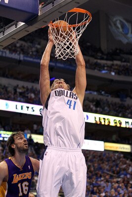DALLAS, TX - MAY 08:  Forward Dirk Nowitzki #41 of the Dallas Mavericks gets the slam dunk against Pau Gasol #16 of the Los Angeles Lakers in Game Four of the Western Conference Semifinals during the 2011 NBA Playoffs on May 8, 2011 at American Airlines C