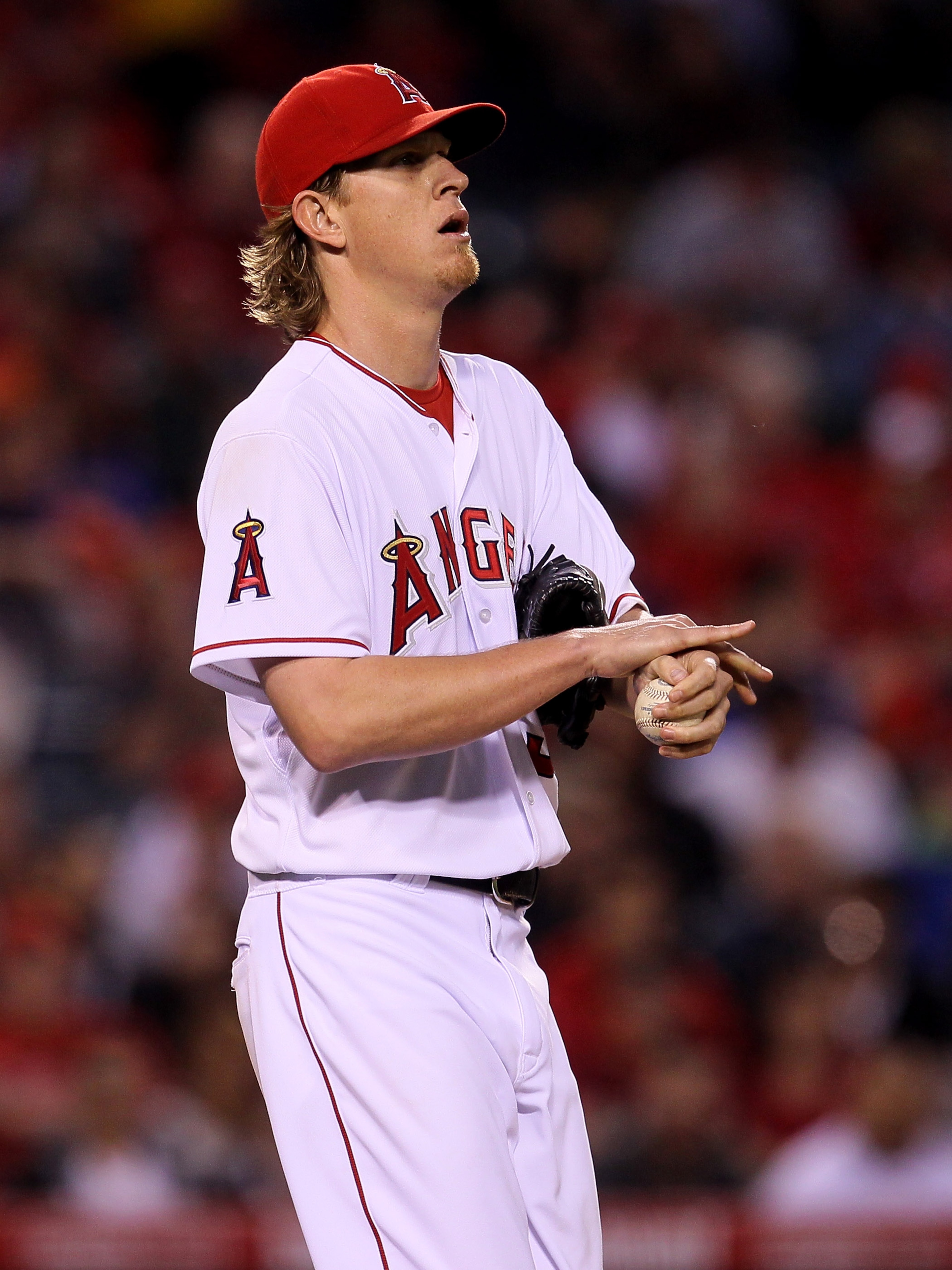 ANAHEIM, CA - MAY 07:  Jered Weaver #36 of the Los Angeles Angels of Anaheim reacts after giving up a two RBI double to Shin-Soo Choo of the Cleveland Indians on May 7, 2011 at Angel Stadium in Anaheim, California.  (Photo by Stephen Dunn/Getty Images)