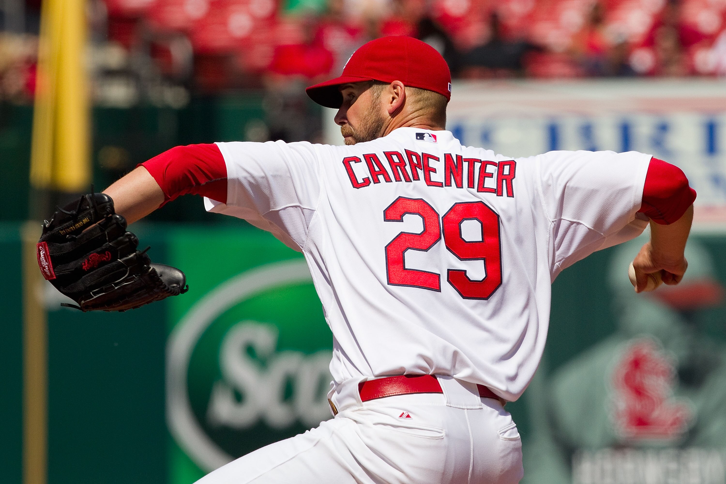 ST. LOUIS, MO - APRIL 6: Starter Chris Carpenter #29 of the St. Louis Cardinals pitches against the Pittsburgh Pirates at Busch Stadium on April 6, 2011 in St. Louis, Missouri.  (Photo by Dilip Vishwanat/Getty Images)