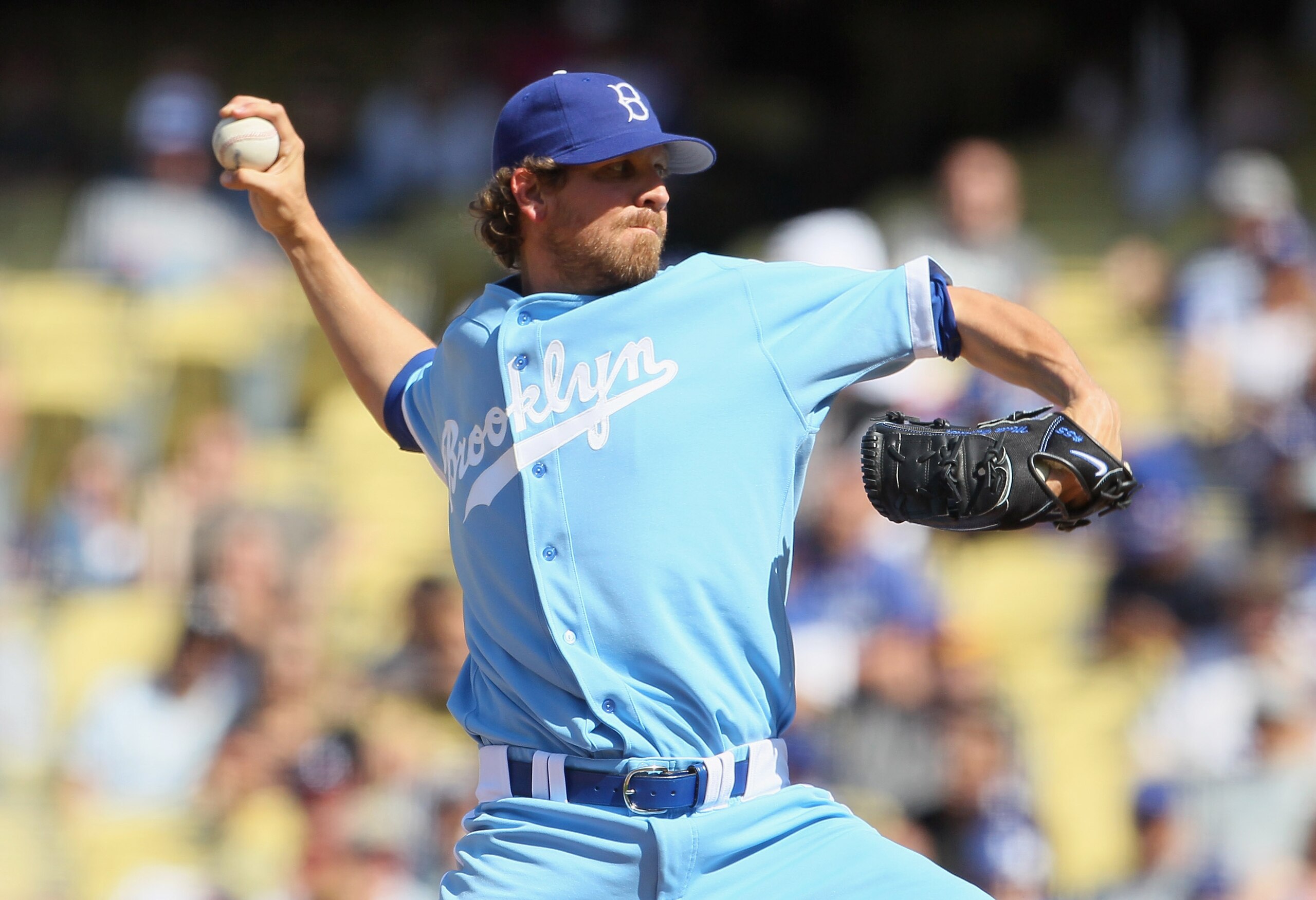 LOS ANGELES, CA - APRIL 21:  Matt Guerrier #55 of the Los Angeles Dodgers pitches against the Atlanta Braves at Dodger Stadium on April 21, 2011 in Los Angeles, California.  (Photo by Jeff Gross/Getty Images)
