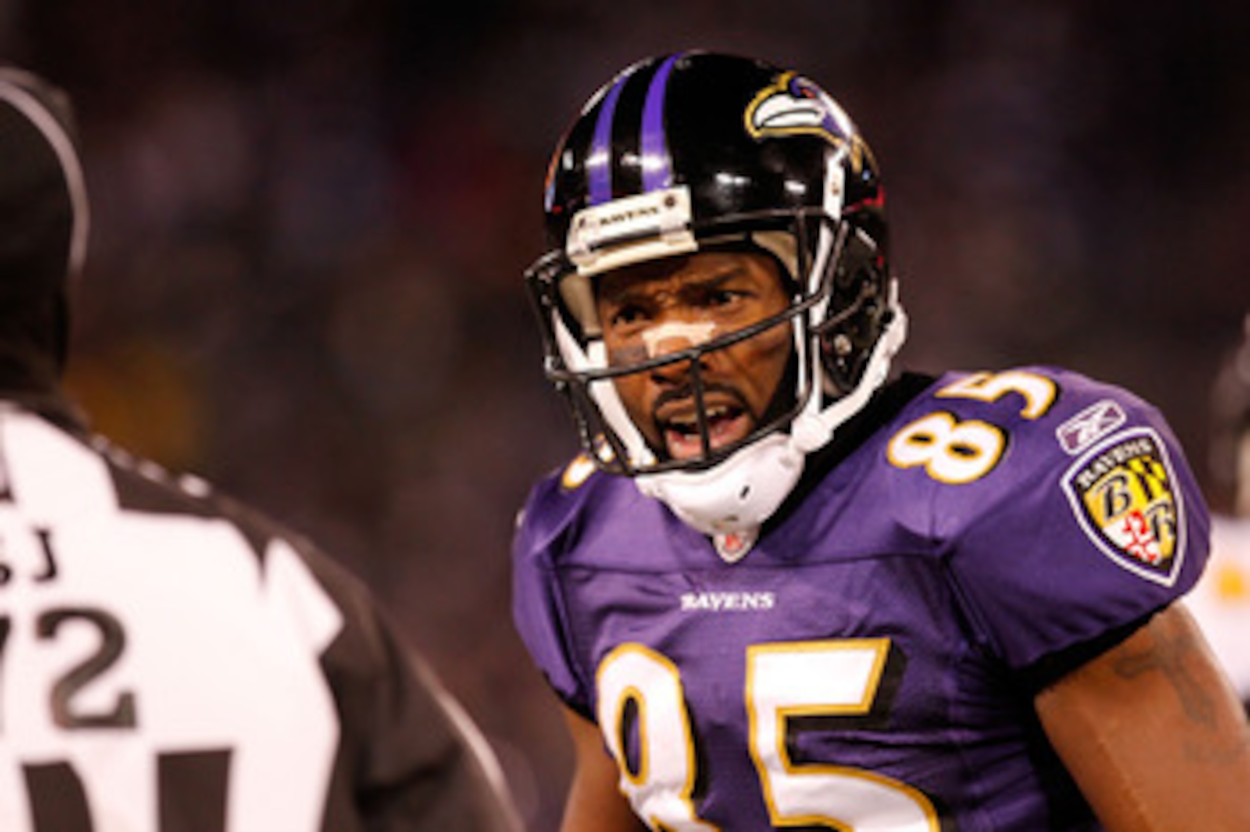 BALTIMORE, MD - DECEMBER 05:  Derrick Mason #85 of the Baltimore Ravens argues a call with a referee during the game against the Pittsburgh Steelers at M&T Bank Stadium on December 5, 2010 in Baltimore, Maryland. Pittsburgh won 13-10.  (Photo by Geoff Bur