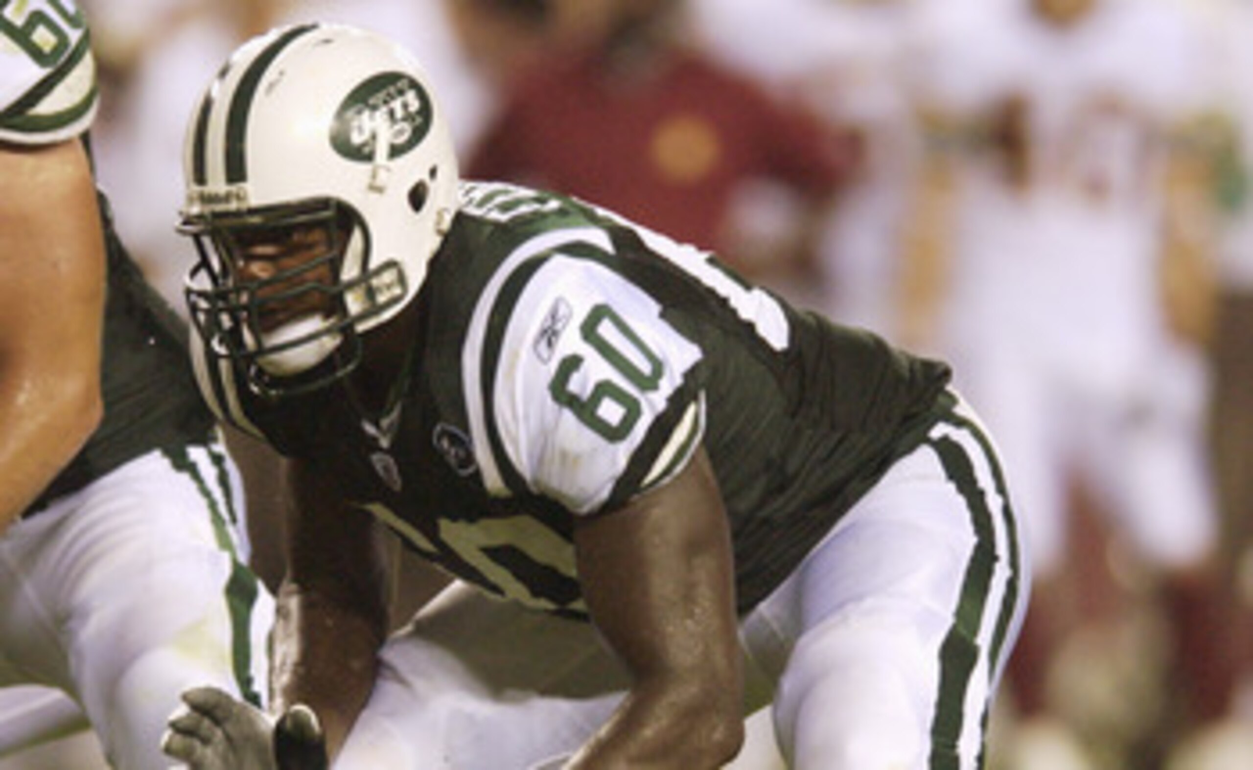 LANDOVER, MD - AUGUST 19:  Tackle D'Brickshaw Ferguson #60 of the New York Jets gets set for play during the NFL preseason game against the Washington Redskins August 19, 2006 at FedEx Field in Landover, Maryland.  (Photo by Greg Fiume/Getty Images)