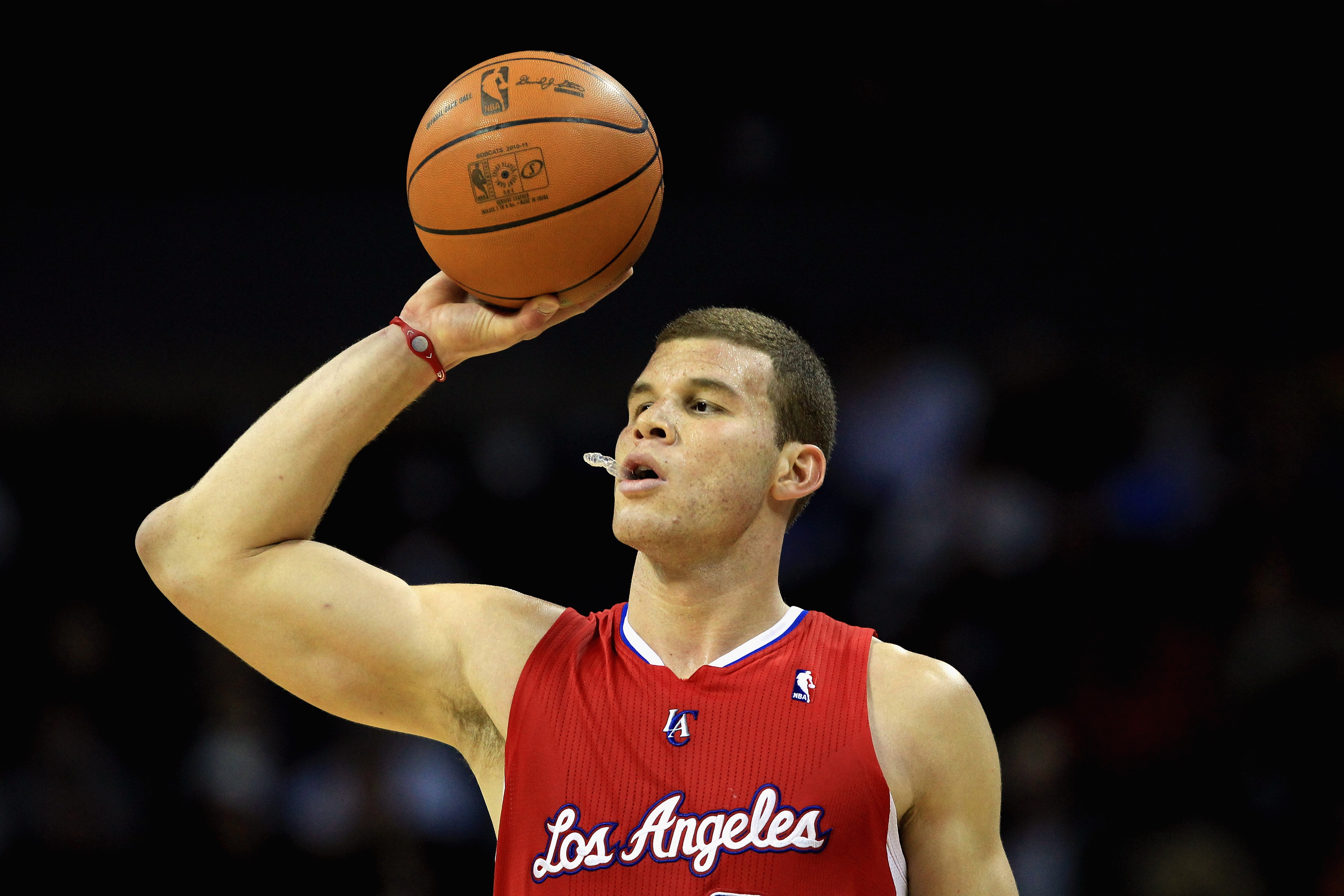 CHARLOTTE, NC - MARCH 07:  Blake Griffin #32 of the Los Angeles Clippers holds the ball during their game against the Charlotte Bobcats at Time Warner Cable Arena on March 7, 2011 in Charlotte, North Carolina. NOTE TO USER: User expressly acknowledges and