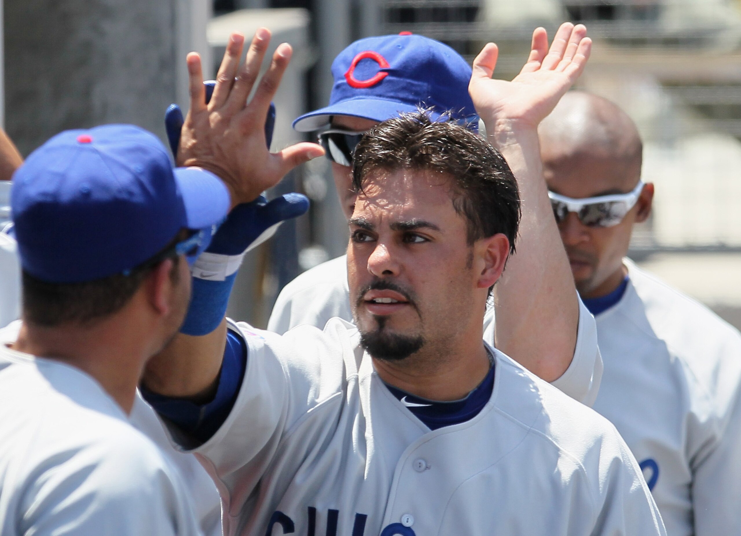 LOS ANGELES, CA - MAY 04: Geovany Soto #18 of the Chicago Cubs receives high fives in the dugout after hitting a solo home run in the fifth inning against the Los Angeles Dodgers at Dodger Stadium on May 4, 2011 in Los Angeles, California. The Cubs defea LOS ANGELES, CA - MAY 04: Geovany Soto #18 of the Chicago Cubs receives high fives in the dugout after hitting a solo home run in the fifth inning against the Los Angeles Dodgers at Dodger Stadium on May 4, 2011 in Los Angeles, California. The Cubs defea