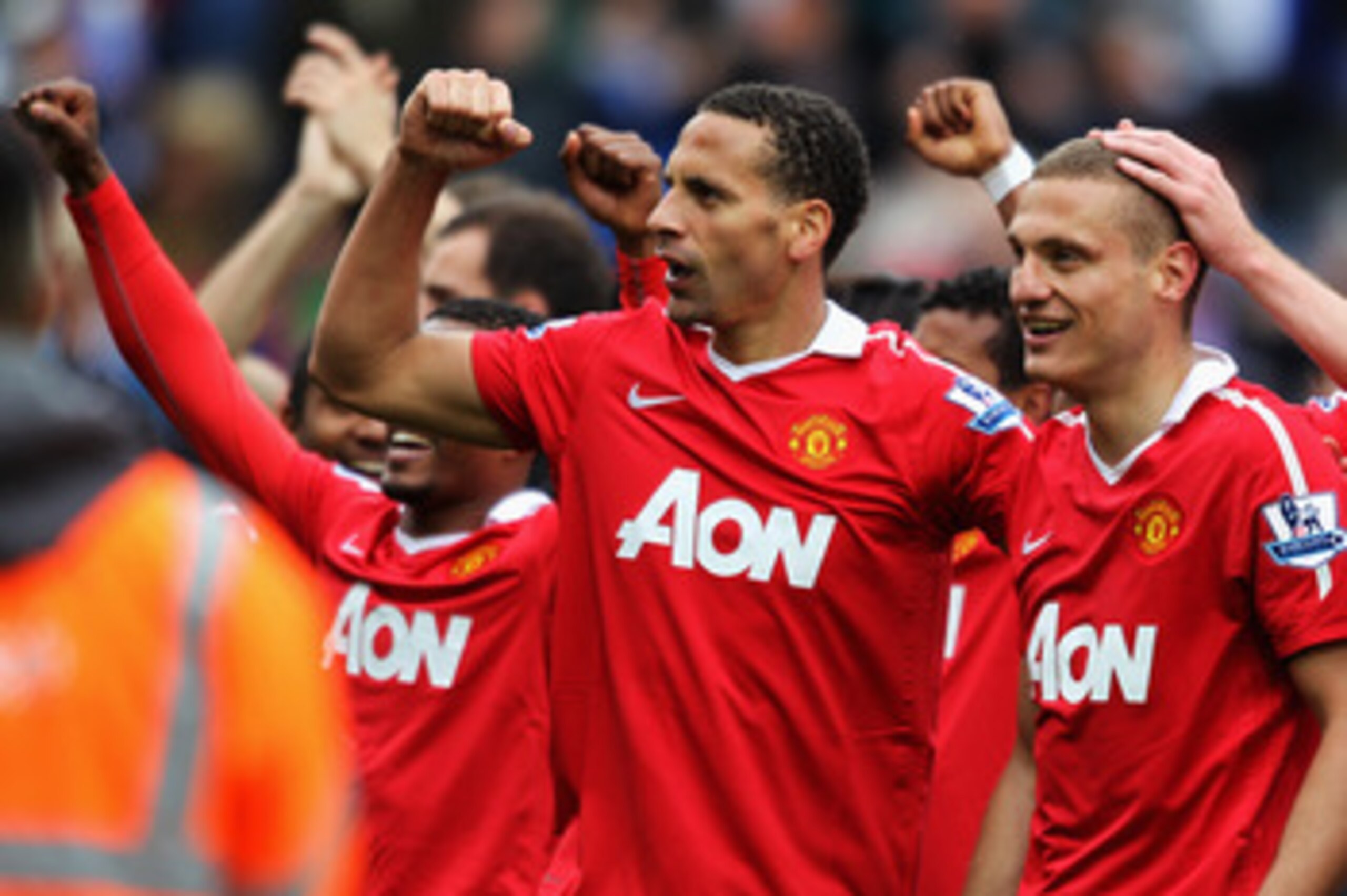 BLACKBURN, ENGLAND - MAY 14:  Rio Ferdinand and Nemanja Vidic of Manchester United celebrate after drawing the Barclays Premier League match between Blackburn Rovers and Manchester United but winning the title at Ewood park on May 14, 2011 in Blackburn, E