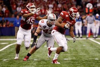NEW ORLEANS, LA - JANUARY 04: Knile Davis #7 of the Arkansas Razorbacks runs with the ball in front of Nathan Williams #43 of the Ohio State Buckeyes in the second half during the Allstate Sugar Bowl at the Louisiana Superdome on January 4, 2011 in New O NEW ORLEANS, LA - JANUARY 04: Knile Davis #7 of the Arkansas Razorbacks runs with the ball in front of Nathan Williams #43 of the Ohio State Buckeyes in the second half during the Allstate Sugar Bowl at the Louisiana Superdome on January 4, 2011 in New O