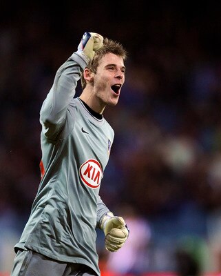 MADRID, SPAIN - FEBRUARY 04:  David de Gea of Atletico Madrid celebrates after his side scored their fourth goal against Racing Santander during the Copa del Rey semi-final, first leg match between Atletico Madrid and Racing Santander at the Vicente Calde