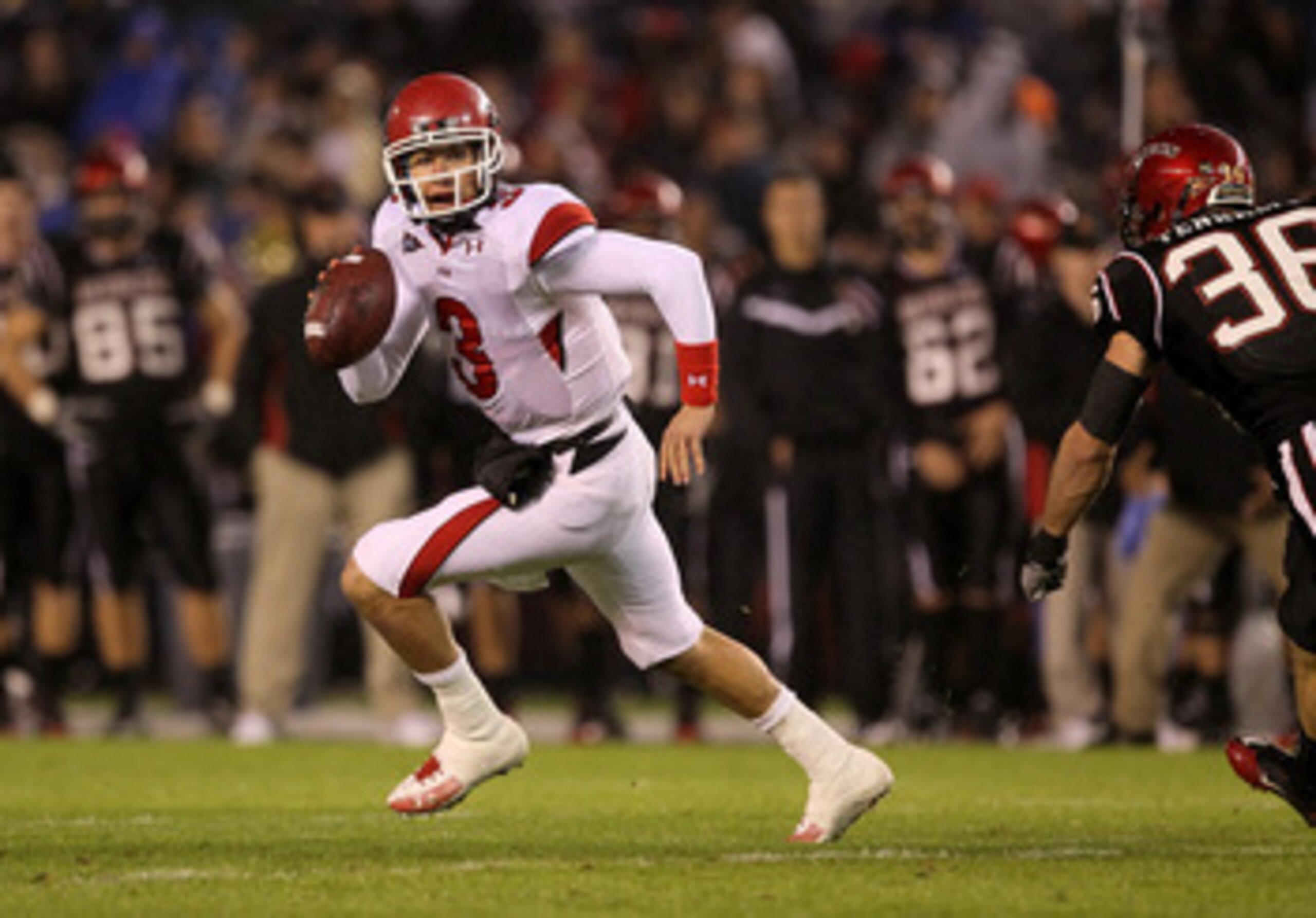 SAN DIEGO - NOVEMBER 20: Quarterback Jordan Wynn #3 of the Utah Utes scrambles against the San Diego State Aztecs at Qualcomm Stadium on November 20, 2010 in San Diego, California. Utah won 38-34. (Photo by Stephen Dunn/Getty Images) SAN DIEGO - NOVEMBER 20: Quarterback Jordan Wynn #3 of the Utah Utes scrambles against the San Diego State Aztecs at Qualcomm Stadium on November 20, 2010 in San Diego, California. Utah won 38-34. (Photo by Stephen Dunn/Getty Images)
