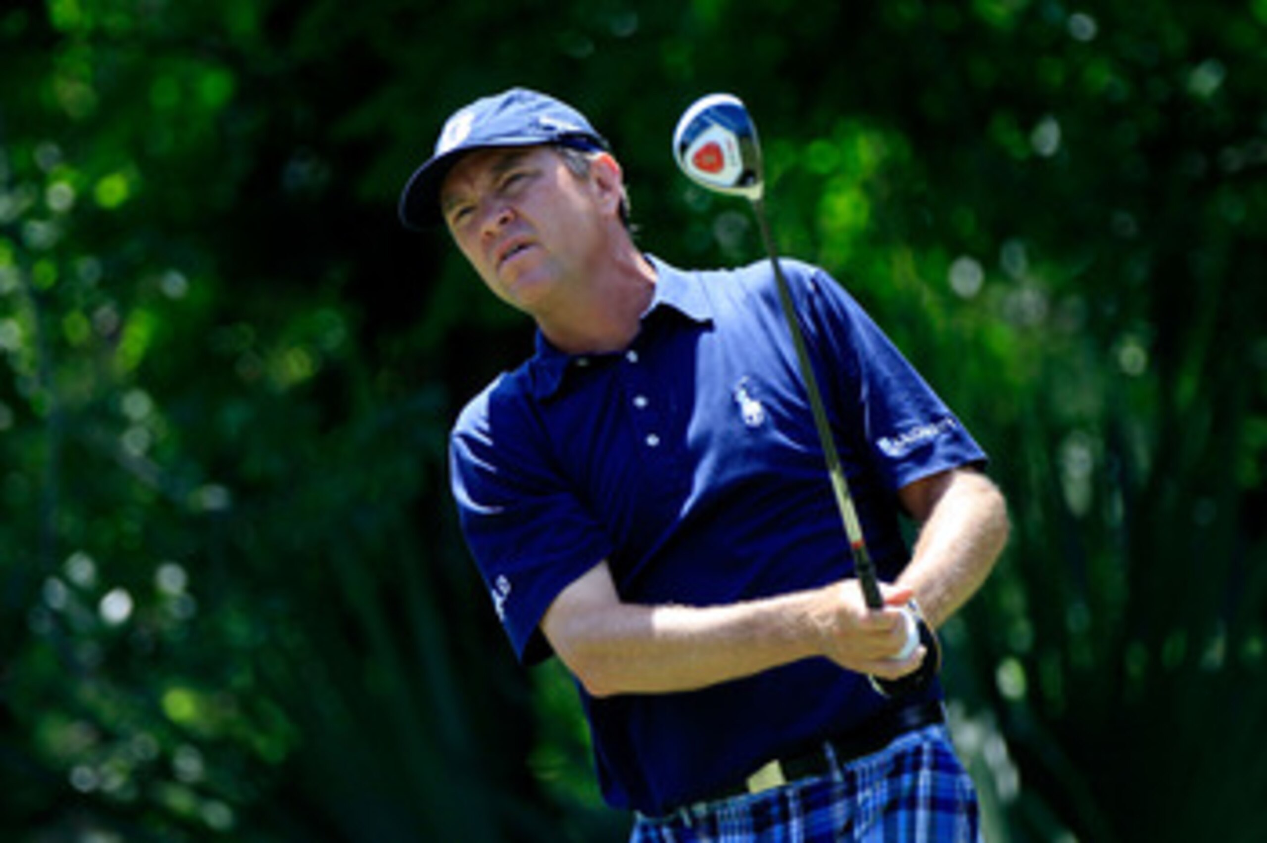 PONTE VEDRA BEACH, FL - MAY 15:  Davis Love III hits his tee shot on the fifth hole during the final round of THE PLAYERS Championship held at THE PLAYERS Stadium course at TPC Sawgrass on May 15, 2011 in Ponte Vedra Beach, Florida.  (Photo by Sam Greenwo