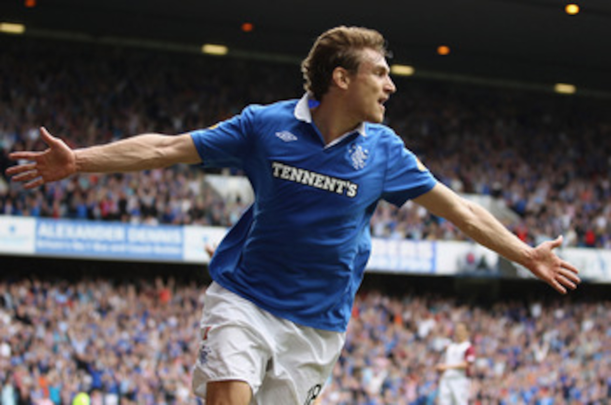GLASGOW, SCOTLAND - MAY 07:  Nikica Jelavic of Rangers celebrates after scoring during the Clydesdale Bank Premier League match between Rangers and Hearts at Ibrox Stadium on May 7, 2011 in Glasgow, Scotland.(Photo by Jeff J Mitchell/Getty Images)
