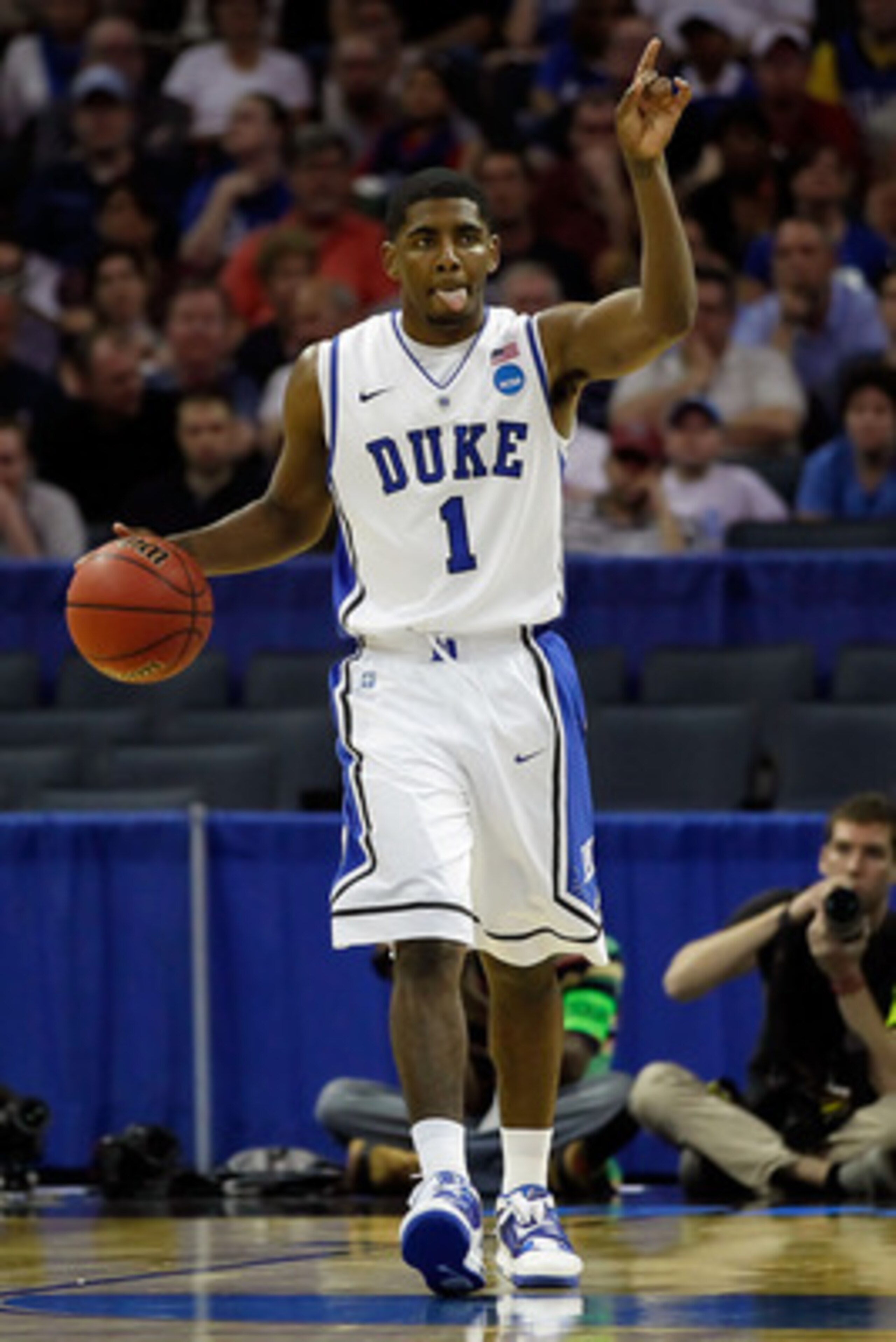 CHARLOTTE, NC - MARCH 18:  Kyrie Irving #1 of the Duke Blue Devils calls a play in the first half while taking on the Hampton Pirates during the second round of the 2011 NCAA men's basketball tournament at Time Warner Cable Arena on March 18, 2011 in Char