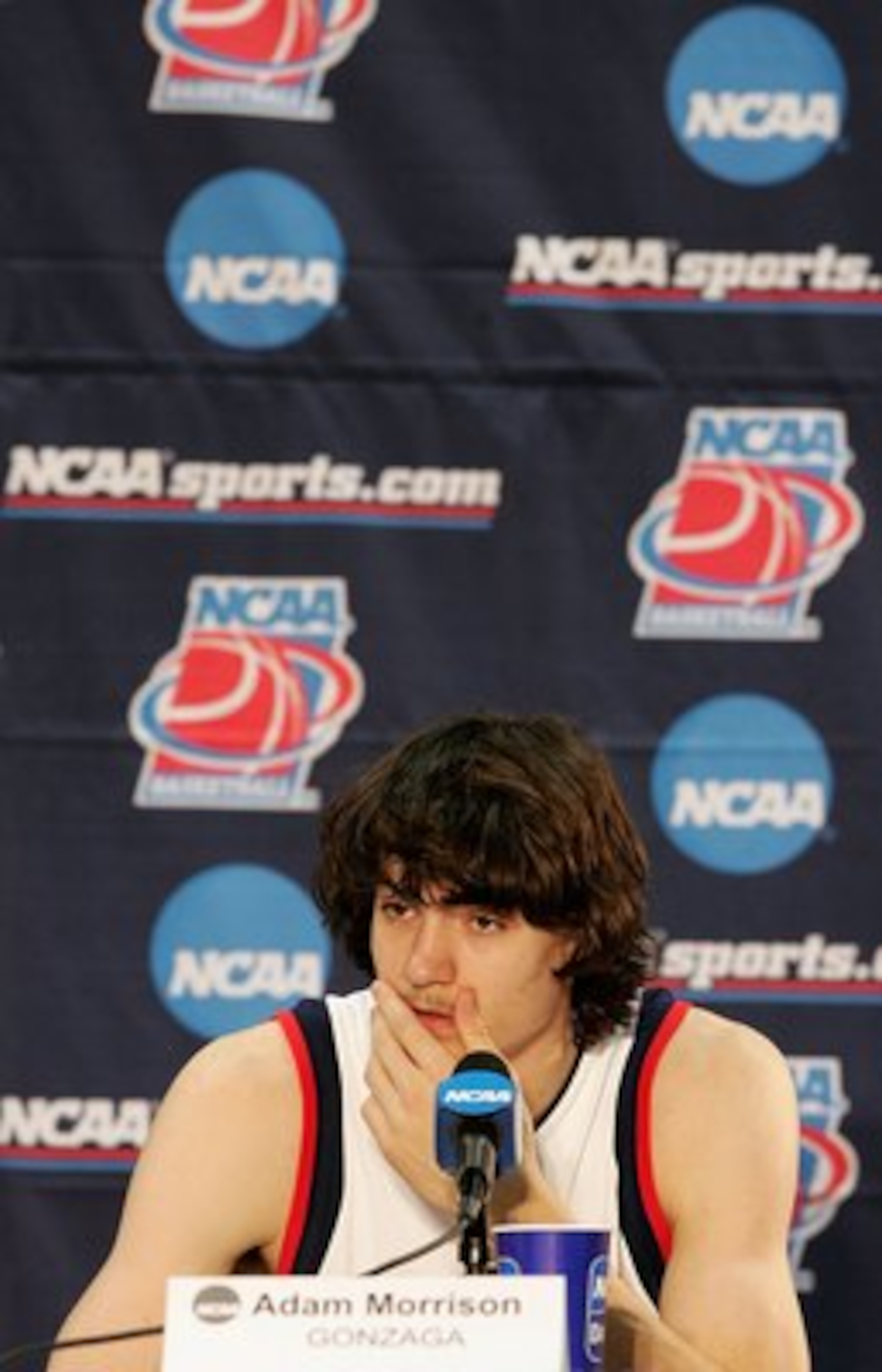 SALT LAKE CITY - MARCH 18:  Adam Morrison #3 of the Gonzaga Bulldogs listens to questions form reporters at a press conferense following Gonzaga's 90-80 win against the Indiana Hoosiers during the Second Round of the 2006 NCAA Men's Basketball Tournament