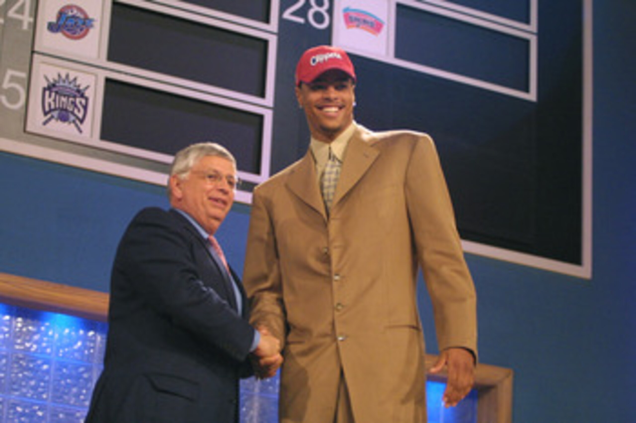 27 Jun 2001:  NBA Commisioner David Stern congratulates Tyson Chandler of Dominguez High School in Compton, California on being the second pick in the NBA Draft by the Los Angeles Clippers at the Theatre in Madison Square Garden in New York City. Mandator