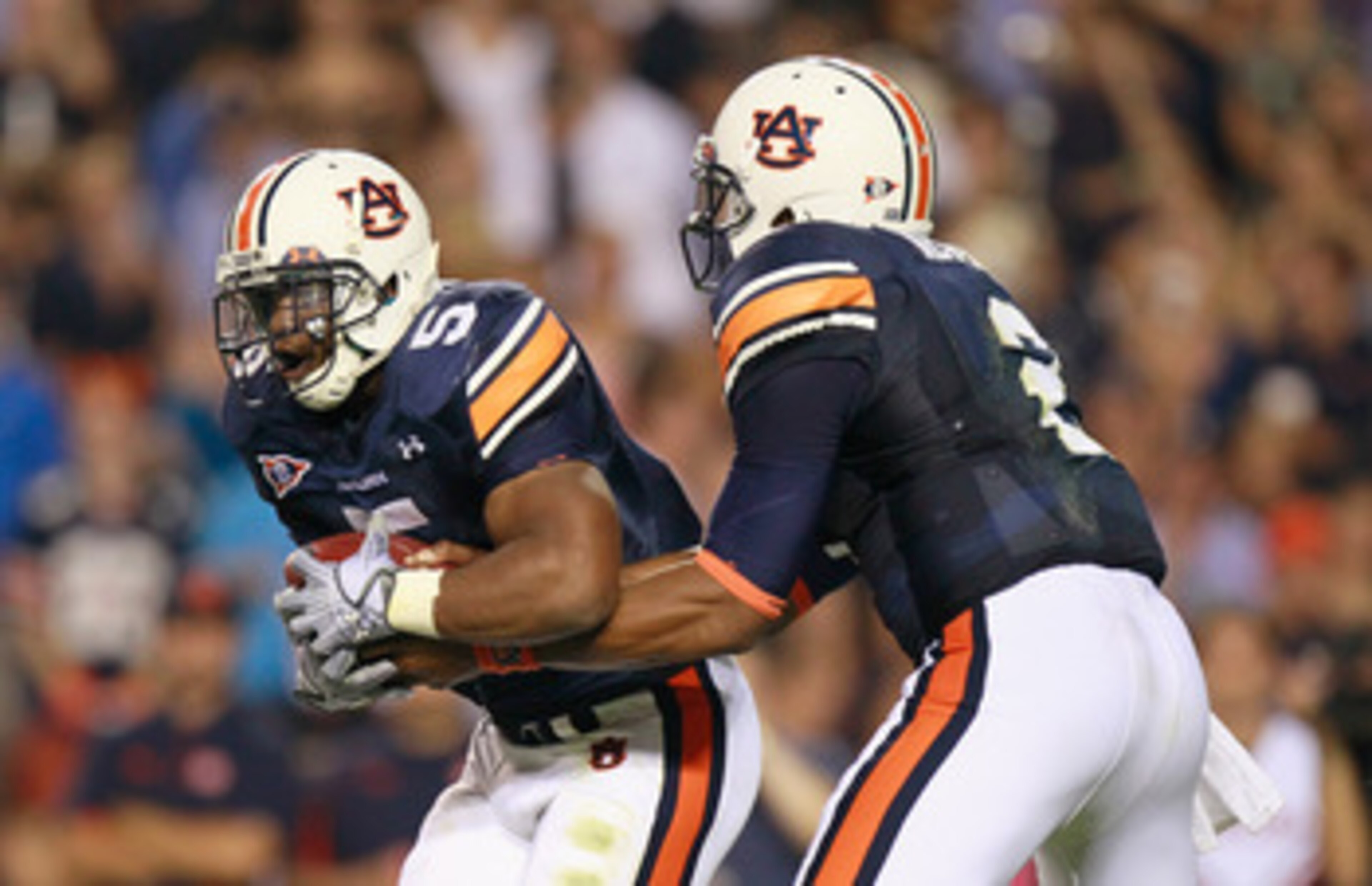 AUBURN, AL - SEPTEMBER 18: Cameron Newton #2 and Michael Dyer #5 of the Auburn Tigers against the Clemson Tigers at Jordan-Hare Stadium on September 18, 2010 in Auburn, Alabama. (Photo by Kevin C. Cox/Getty Images) AUBURN, AL - SEPTEMBER 18: Cameron Newton #2 and Michael Dyer #5 of the Auburn Tigers against the Clemson Tigers at Jordan-Hare Stadium on September 18, 2010 in Auburn, Alabama. (Photo by Kevin C. Cox/Getty Images)