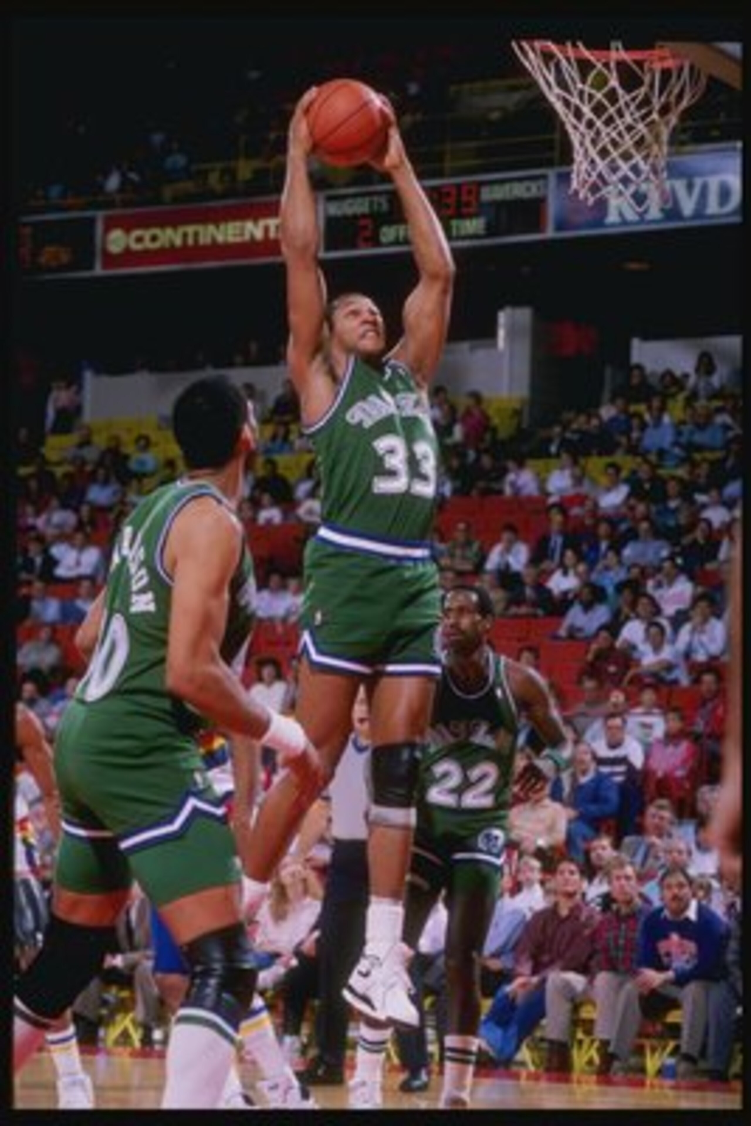 1989:  Forward Randy White of the Dallas Mavericks grabs the rebound during a game against the Denver Nuggets at McNichols Arena in Denver, Colorado. Mandatory Credit: Tim de Frisco  /Allsport