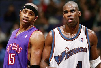 WAHINGTON DC - NOVEMBER 23:  Antawn Jamison #4 of the Washington Wizards and Vince Carter #15 of the Toronoto Raptors talk during a free throw as the Wizards defeated the Raptors 102-86 November 23, 2004 at the MCI Center in Washington D.C.  NOTE TO USER:
