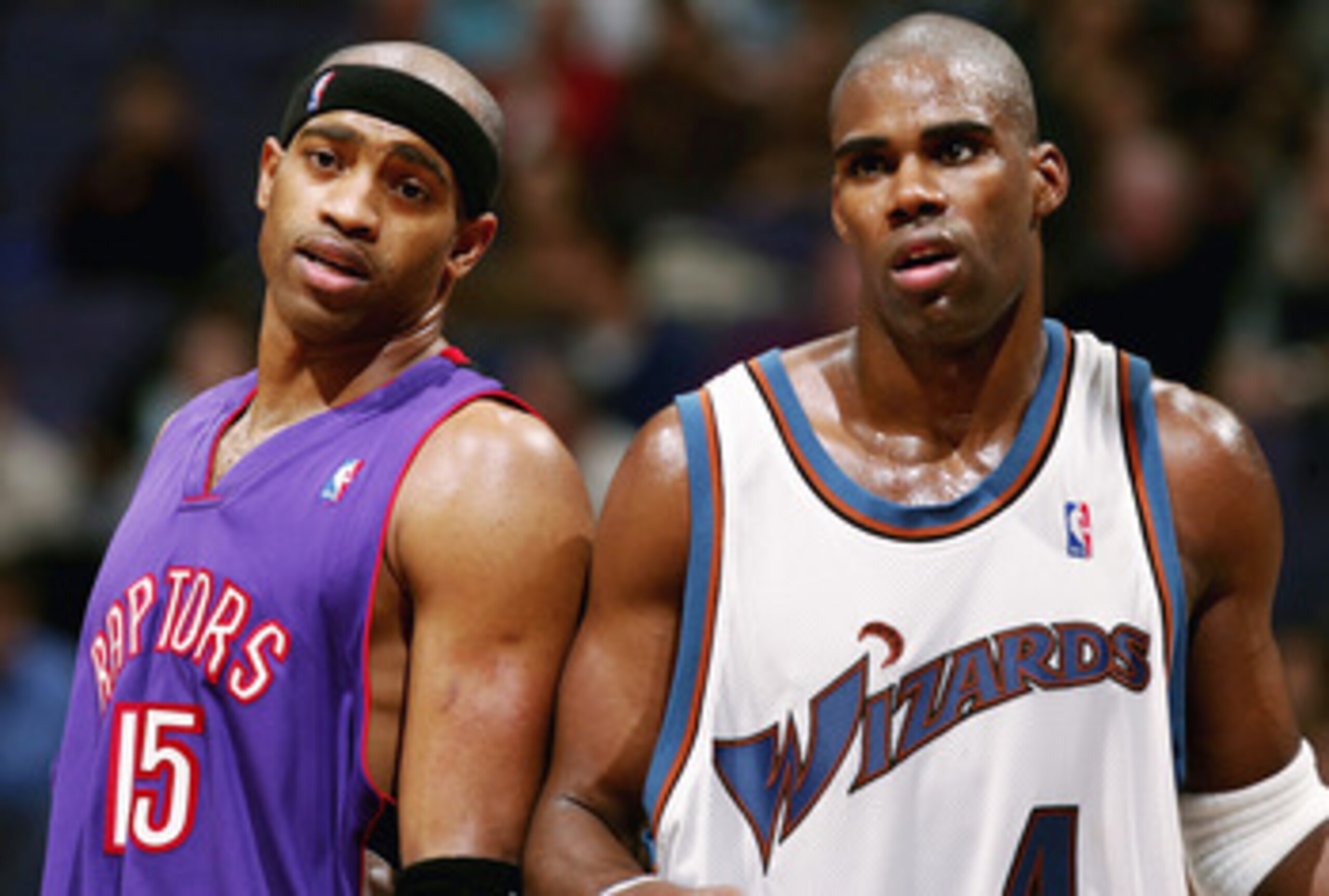 WAHINGTON DC - NOVEMBER 23:  Antawn Jamison #4 of the Washington Wizards and Vince Carter #15 of the Toronoto Raptors talk during a free throw as the Wizards defeated the Raptors 102-86 November 23, 2004 at the MCI Center in Washington D.C.  NOTE TO USER:
