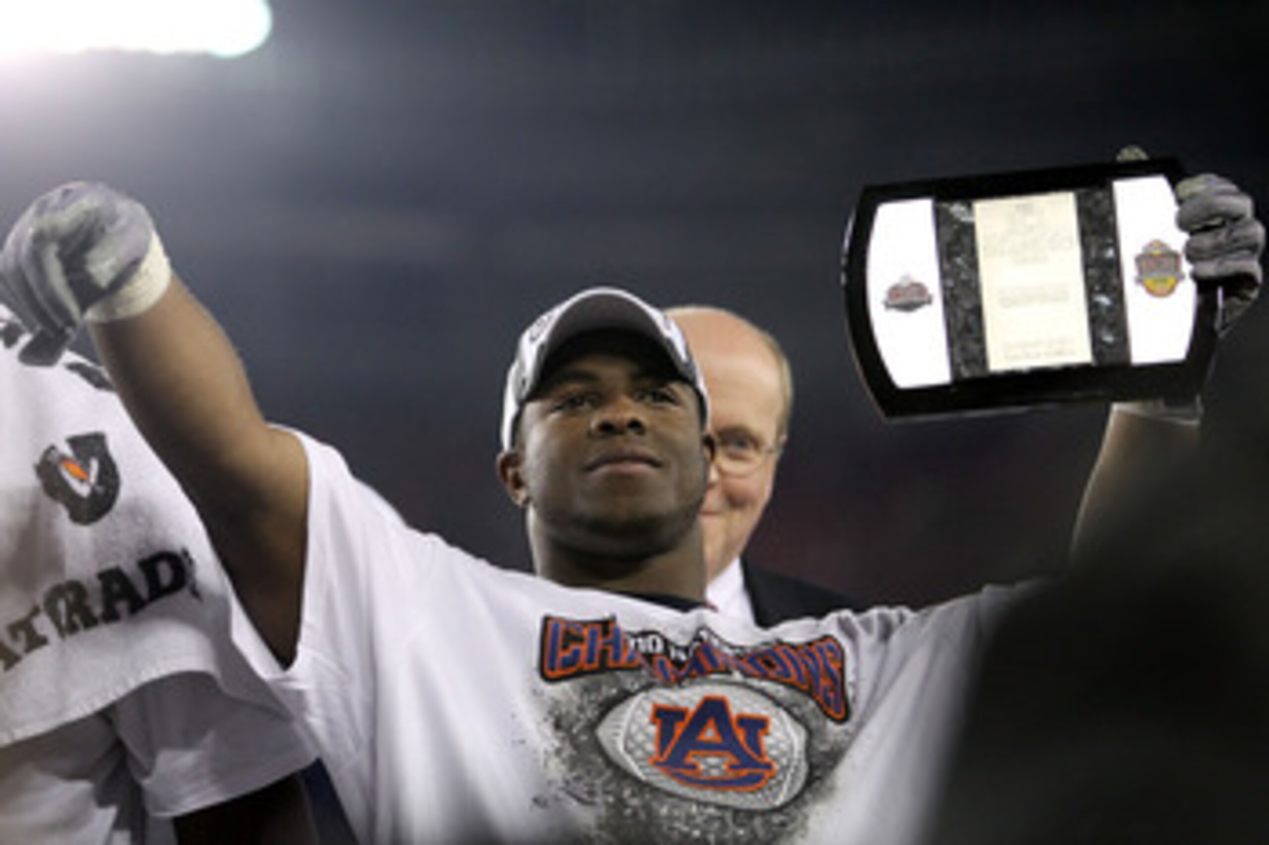 GLENDALE, AZ - JANUARY 10:  Michael Dyer #5 of the Auburn Tigers celebrates their 22 to 19 win over the Oregon Ducks in the Tostitos BCS National Championship Game at University of Phoenix Stadium on January 10, 2011 in Glendale, Arizona.  (Photo by Ronal