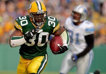 GREEN BAY, WI - DECEMBER 17:  Ahman Green #30 of the Green Bay Packers carries the ball against the Detroit Lions on December 17, 2006 at Lambeau Field in Green Bay, Wisconsin. The Packers defeated the Lions 17-9.  (Photo by Matthew Stockman/Getty Images)