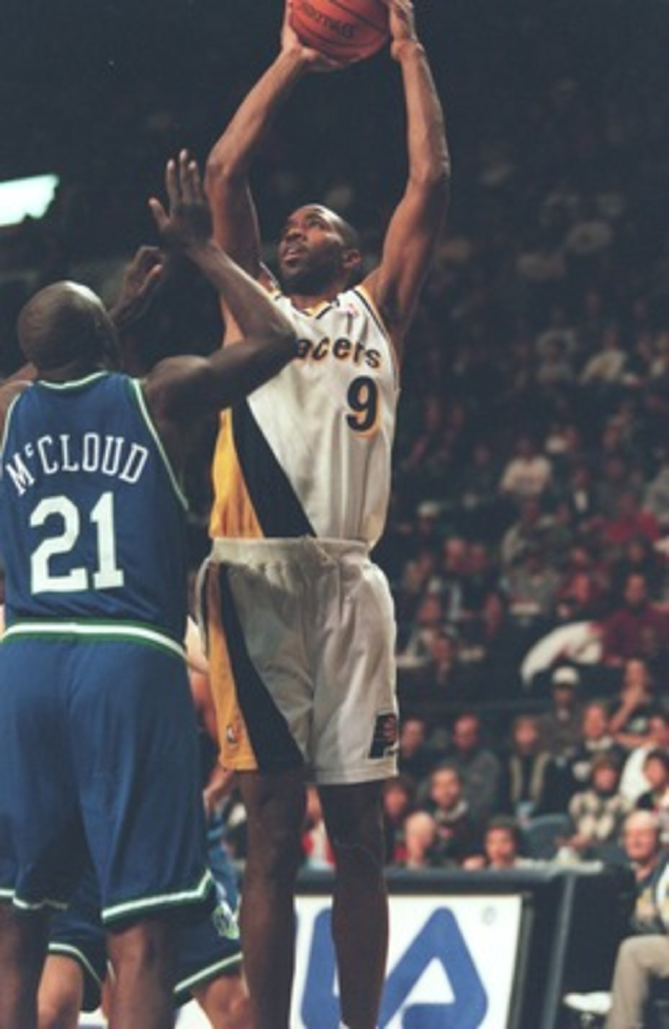 22 Dec 1995:  Derrick McKey #9 of the Indiana Pacers tries to shoot over George McCloud of the Dallas Mavericks in the game at the Market Square Arena in Indianapolis, Indiana.     Mandatory Credit: Allsport USA/Allsport