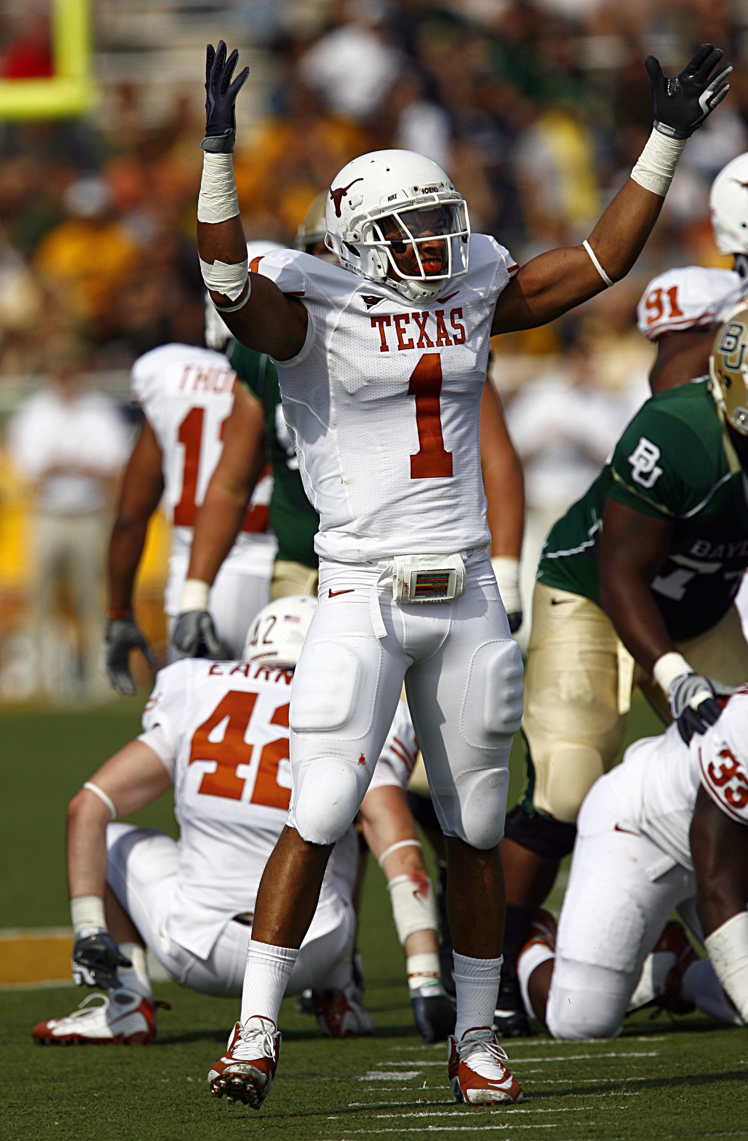 WACO, TX - NOVEMBER 14:  Linebacker Keenan Robinson #1 of the Texas celebrates after sacking quarterback Nick Florence #11 of the Baylor Bears in the second half on November 14, 2009 at Floyd Casey Stadium in Waco, Texas.  The Longhorns beat the Bears 47-