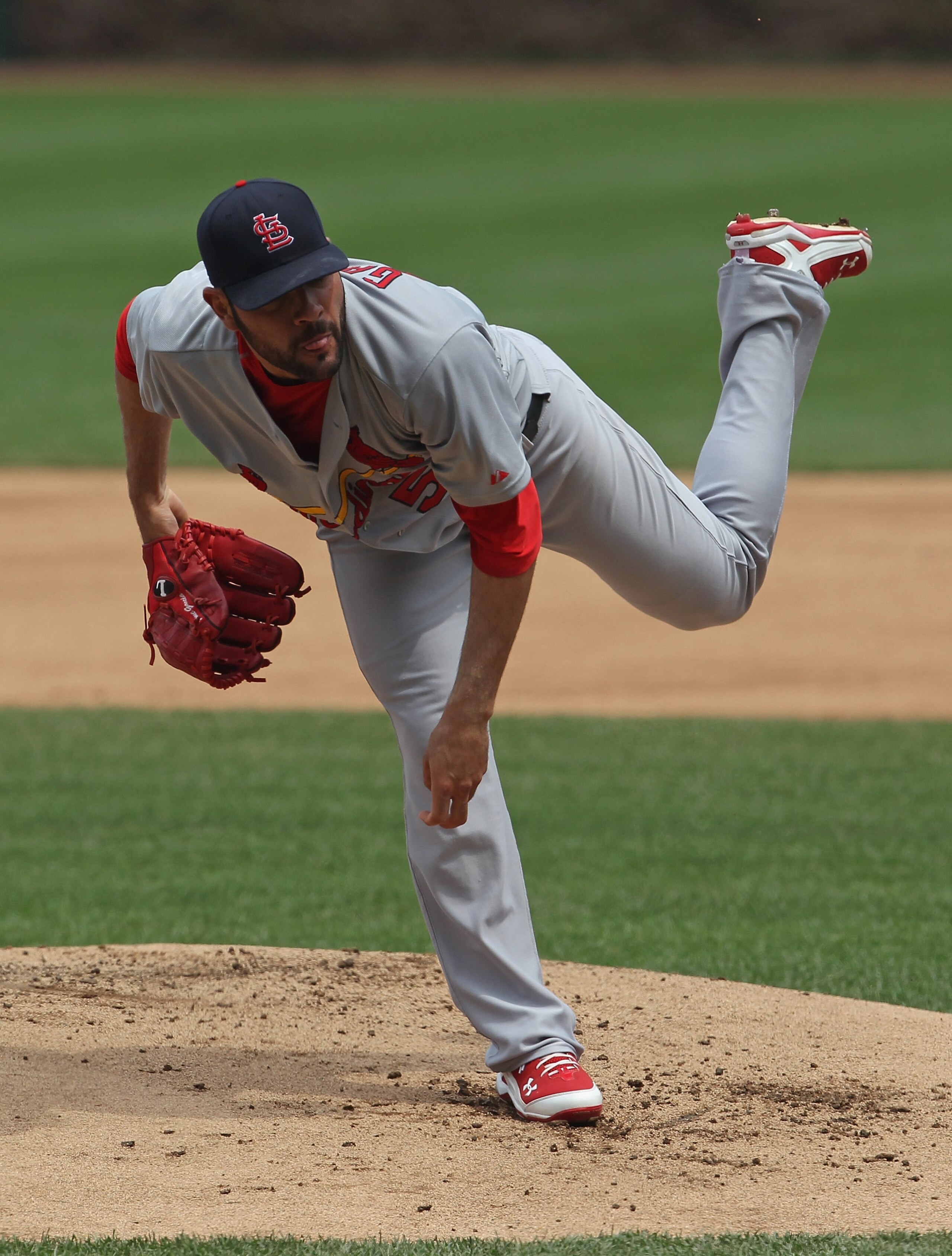 CHICAGO, IL - MAY 12: Starting pitcher Jamie Garcia #54 of the St. Louis Cardinals follows through after delivering the ball against the Chicago Cubs at Wrigley Field on May 12, 2011 in Chicago, Illinois.  (Photo by Jonathan Daniel/Getty Images)