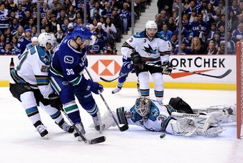 VANCOUVER, CANADA - MAY 15:  Goaltender Antti Niemi #31 of the San Jose Sharks makes a save on shot by Jannik Hansen #36 of the Vancouver Canucks in the second period in Game One of the Western Conference Finals during the 2011 Stanley Cup Playoffs at Rog