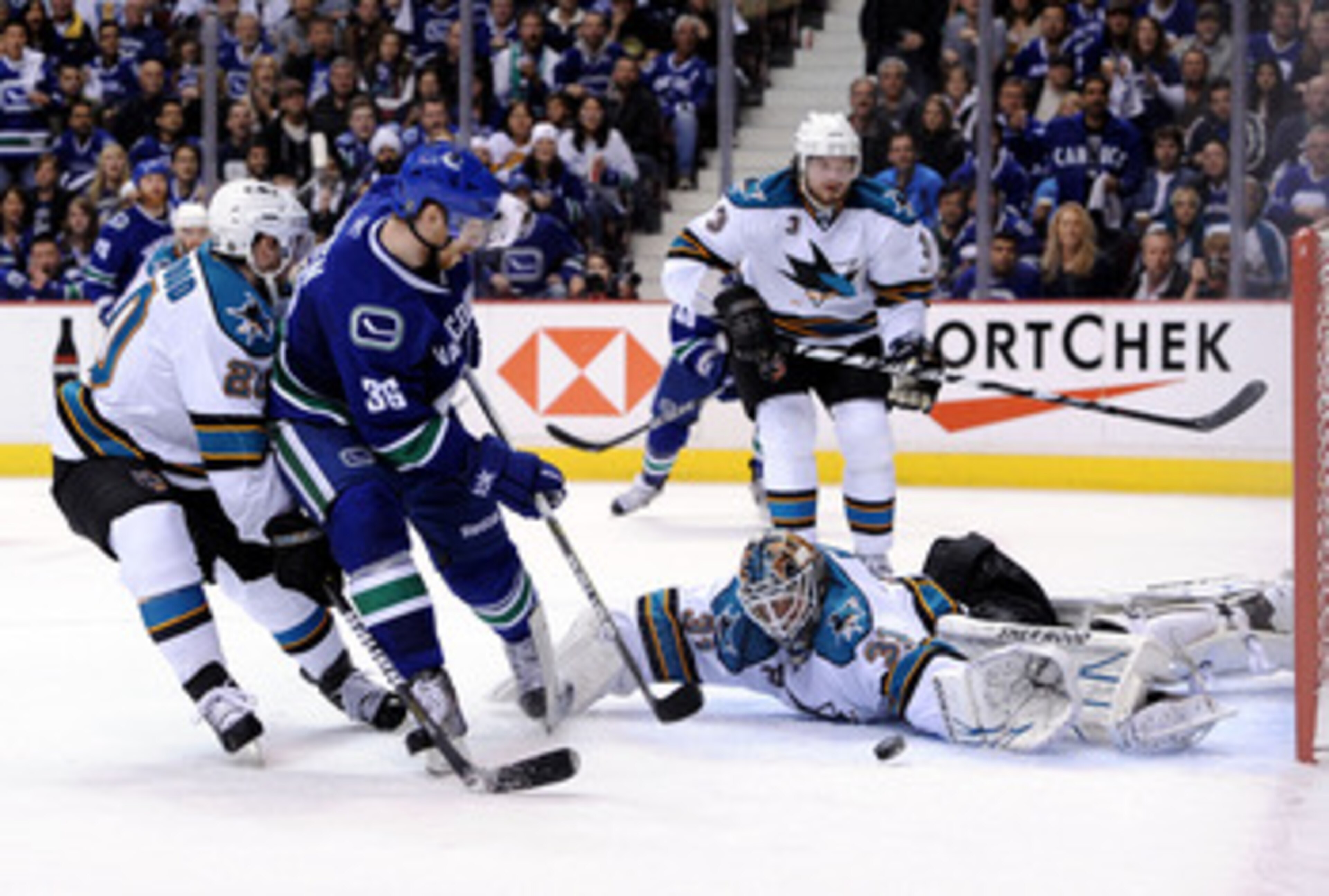 VANCOUVER, CANADA - MAY 15:  Goaltender Antti Niemi #31 of the San Jose Sharks makes a save on shot by Jannik Hansen #36 of the Vancouver Canucks in the second period in Game One of the Western Conference Finals during the 2011 Stanley Cup Playoffs at Rog