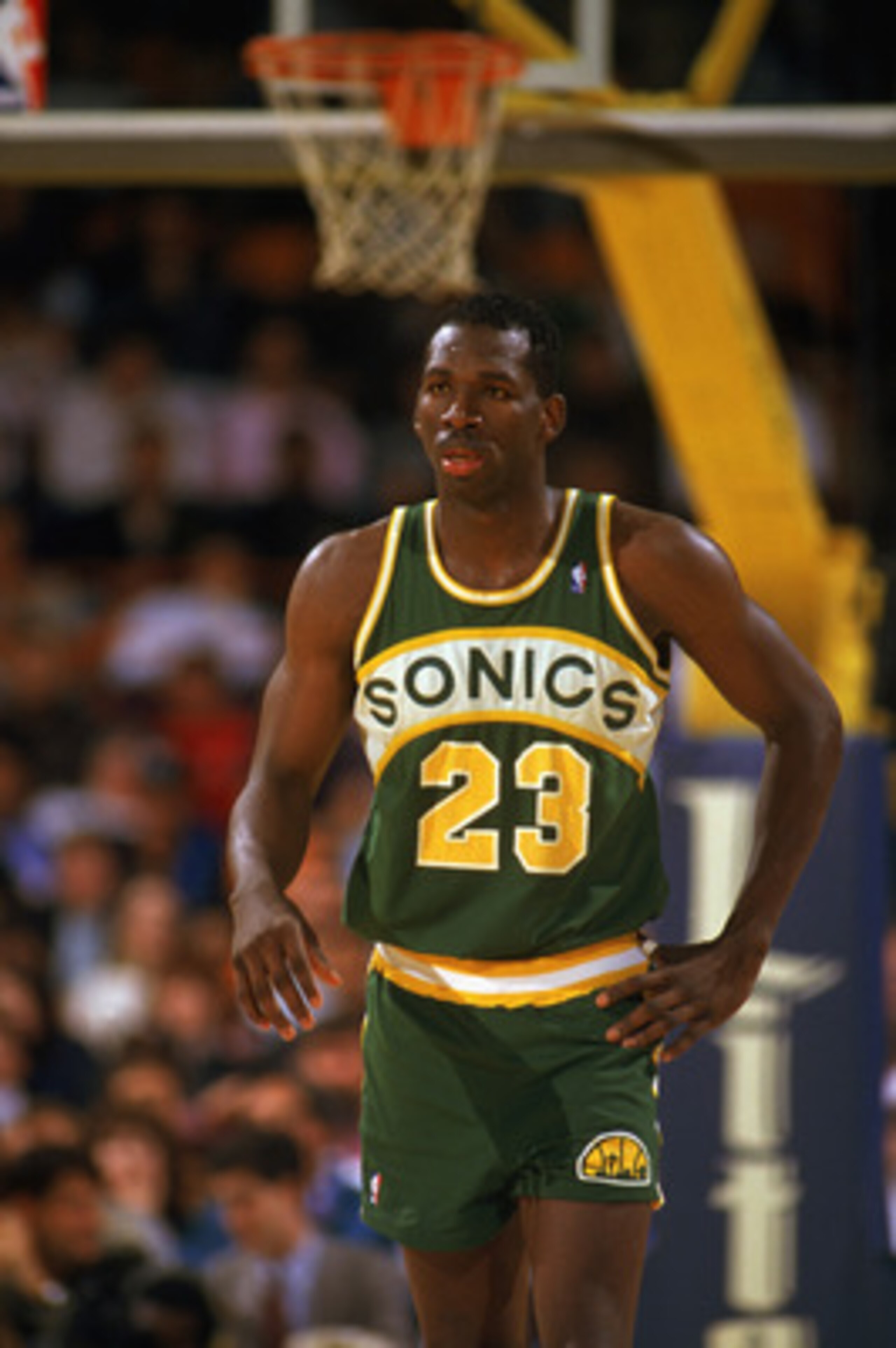 LOS ANGELES - 1990:  Olden Polynice #23 of the Seattle Supersonics walks on the court during a game against the Los Angeles Lakers in the 1989-1990 NBA season at the Great Western Forum in Los Angeles, California.  (Photo by Ken Levine/Getty Images)