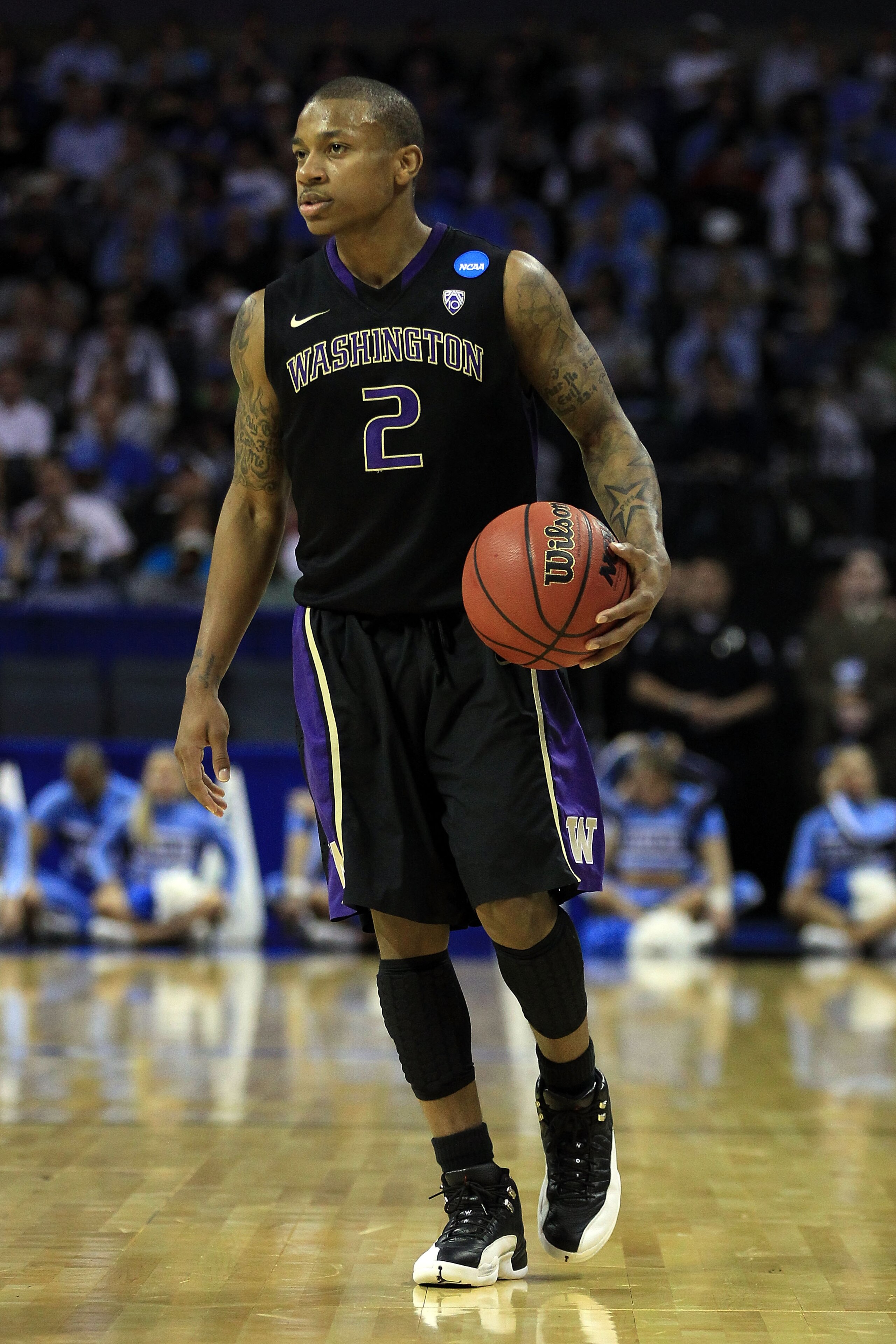 CHARLOTTE, NC - MARCH 20: Isaiah Thomas #2 of the Washington Huskies moves the ball while taking on the North Carolina Tar Heels during the third round of the 2011 NCAA men's basketball tournament at Time Warner Cable Arena on March 20, 2011 in Charlotte CHARLOTTE, NC - MARCH 20: Isaiah Thomas #2 of the Washington Huskies moves the ball while taking on the North Carolina Tar Heels during the third round of the 2011 NCAA men's basketball tournament at Time Warner Cable Arena on March 20, 2011 in Charlotte