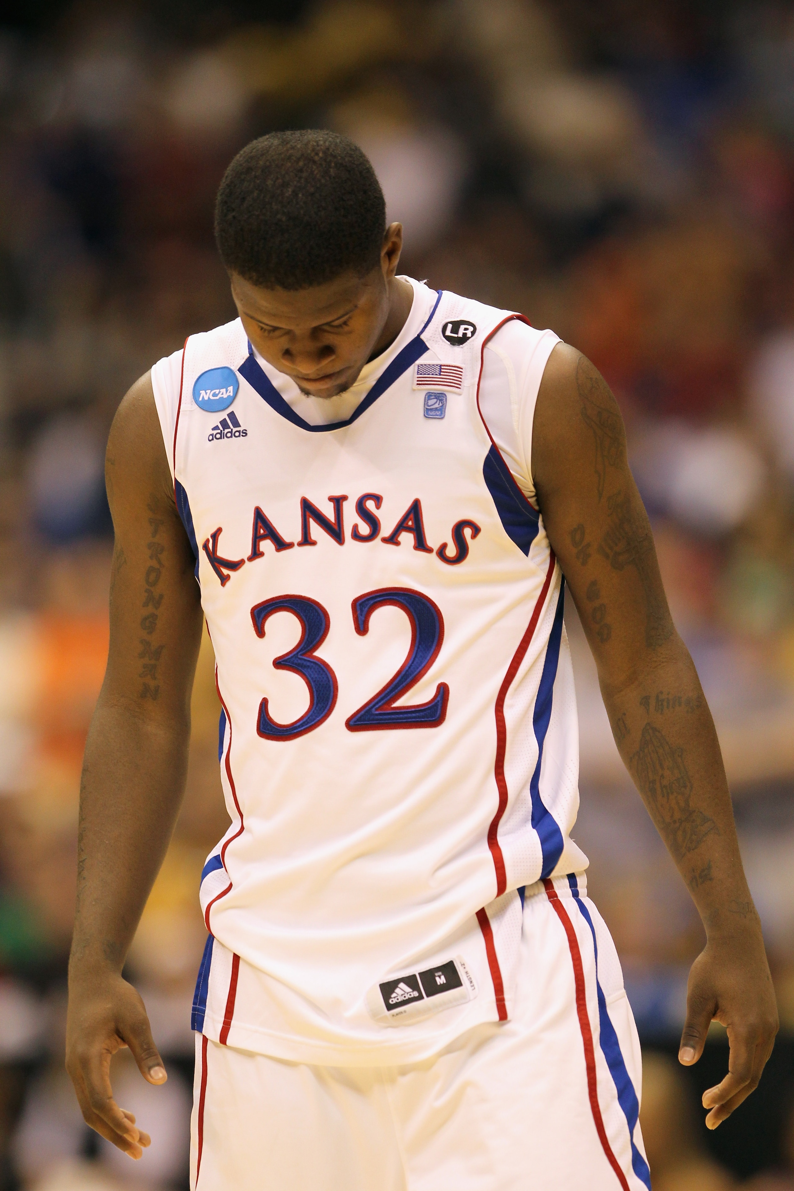 SAN ANTONIO, TX - MARCH 27: Josh Selby #32 of the Kansas Jayhawks reacts after the southwest regional final of the 2011 NCAA men's basketball tournament against the Virginia Commonwealth Rams at the Alamodome on March 27, 2011 in San Antonio, Texas. Virg SAN ANTONIO, TX - MARCH 27: Josh Selby #32 of the Kansas Jayhawks reacts after the southwest regional final of the 2011 NCAA men's basketball tournament against the Virginia Commonwealth Rams at the Alamodome on March 27, 2011 in San Antonio, Texas. Virg