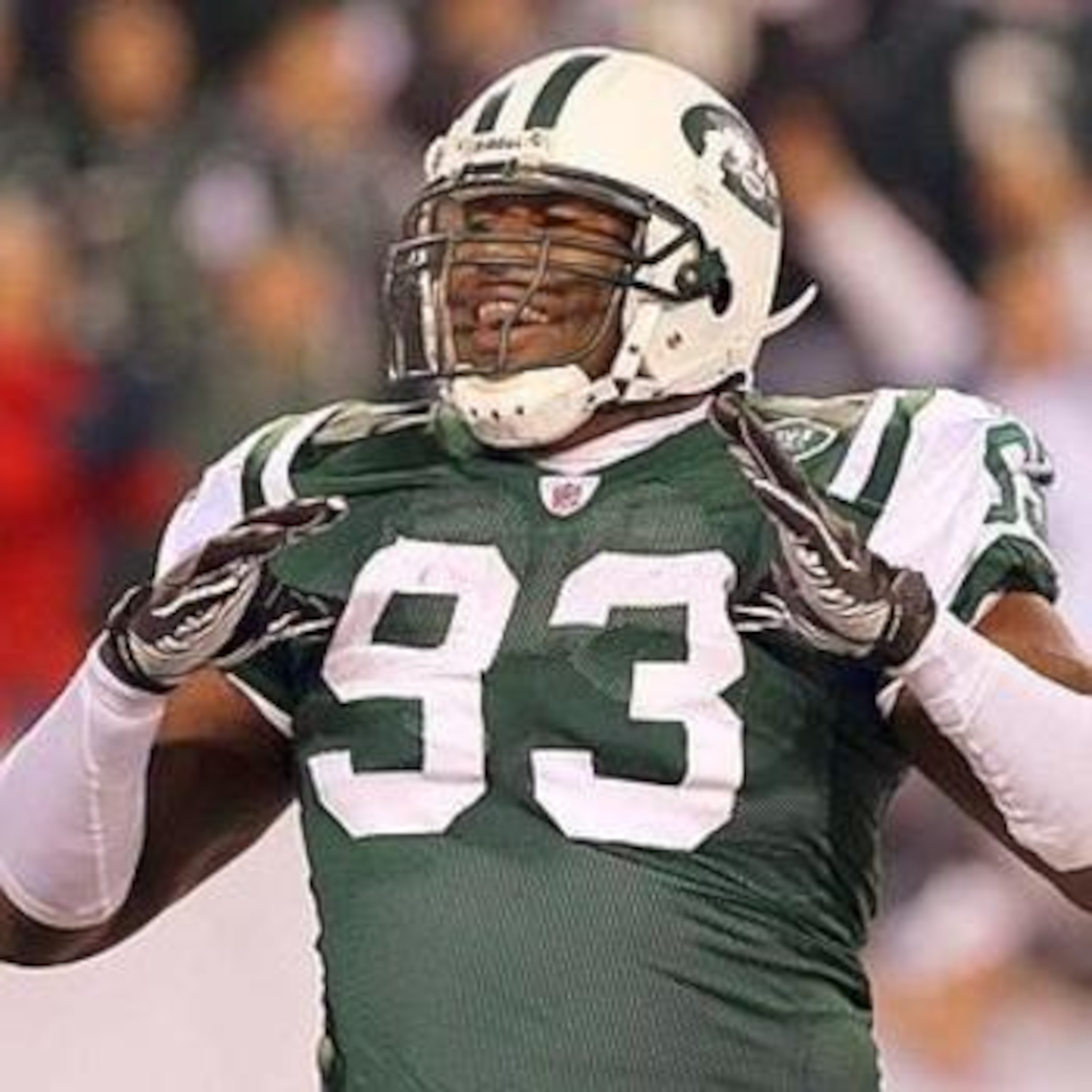 EAST RUTHERFORD, NJ - NOVEMBER 25:  Quarterback Carson Palmer #9 of the Cincinnati Bengals is tackled for a safety by Trevor Pryce #93 of the New York Jets at New Meadowlands Stadium on November 25, 2010 in East Rutherford, New Jersey. The Jets defeated t