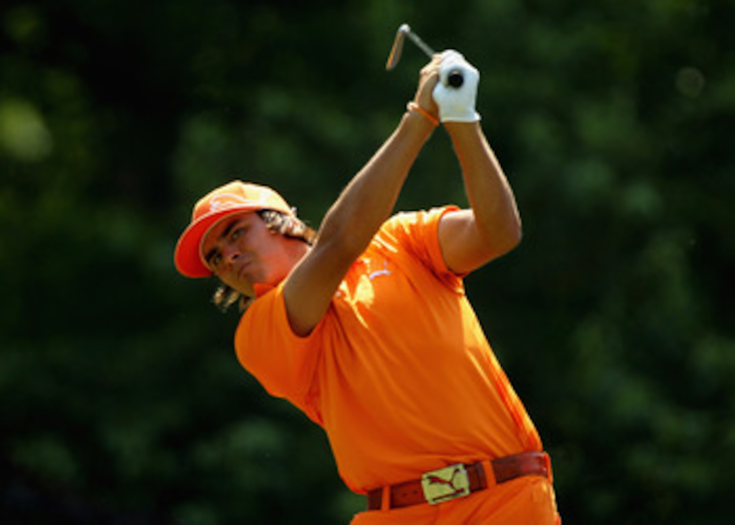 CHARLOTTE, NC - MAY 08:  Rickie Fowler hits a shot during the final round of the Wells Fargo Championship at the Quail Hollow Club on May 8, 2011 in Charlotte, North Carolina.  (Photo by Scott Halleran/Getty Images)