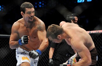 DALLAS - SEPTEMBER 19:  UFC fighter Vitor Belfort  (L) battles UFC fighter Rich Franklin (R) during their Catch weight bout at UFC 103: Franklin vs. Belfort at the American Airlines Center on September 19, 2009 in Dallas, Texas.  (Photo by Jon Kopaloff/Ge