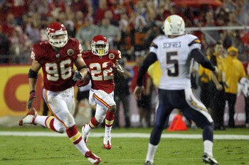 KANSAS CITY, MO - SEPTEMBER 13:  Dexter McCluster #22 of the Kansas City Chiefs returns a punt for a touchdown as punter Mike Scifres #5 of the San Diego Chargers defends during the 1st half of the game against on September 13, 2010 at Arrowhead Stadium i