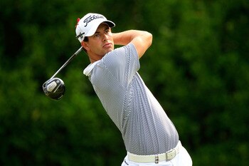 PONTE VEDRA BEACH, FL - MAY 12:  Adam Scott of Australia hits his tee shot on the 11th hole during the first round of THE PLAYERS Championship held at THE PLAYERS Stadium course at TPC Sawgrass on May 12, 2011 in Ponte Vedra Beach, Florida.  (Photo by Sam