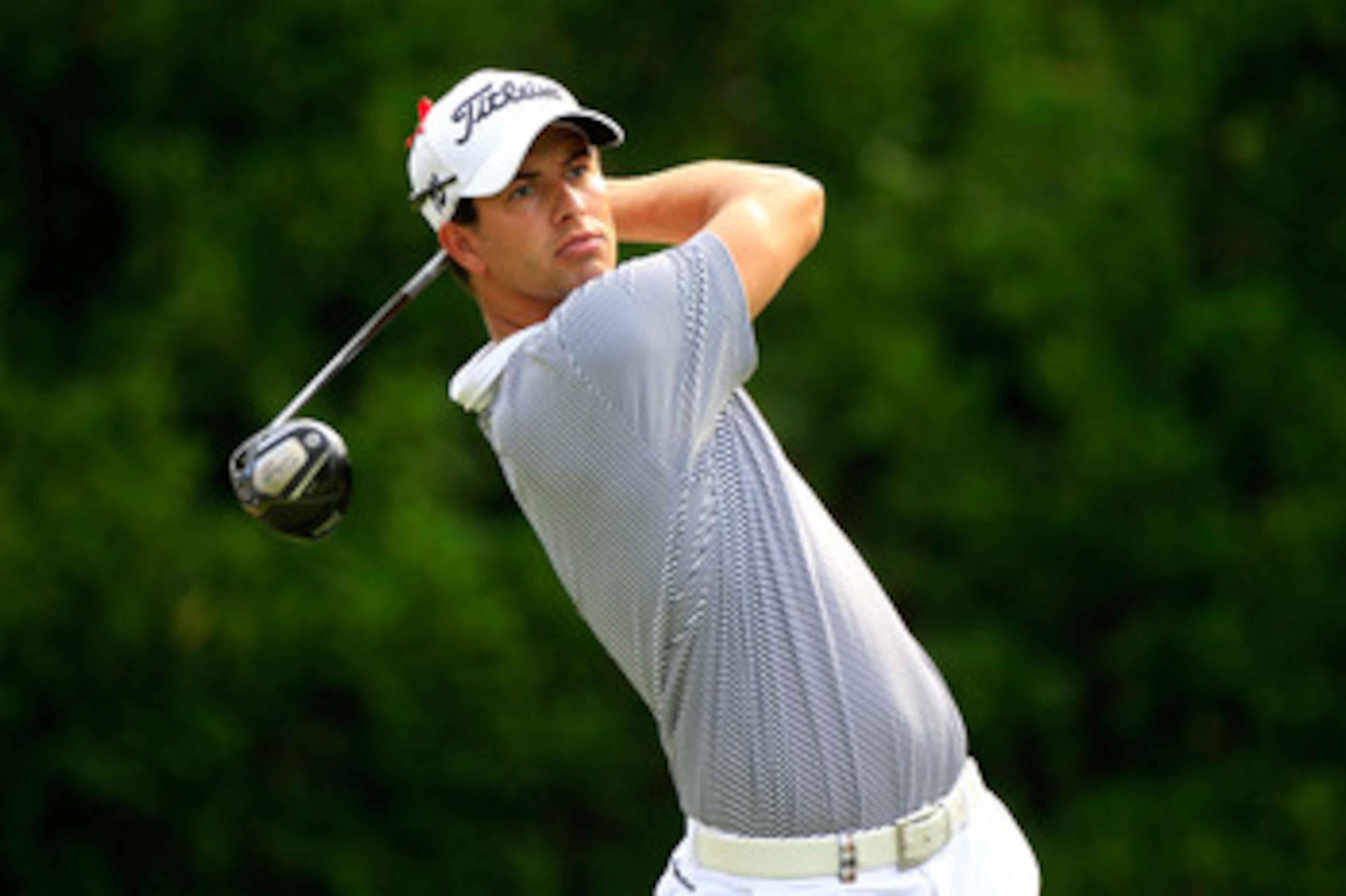 PONTE VEDRA BEACH, FL - MAY 12:  Adam Scott of Australia hits his tee shot on the 11th hole during the first round of THE PLAYERS Championship held at THE PLAYERS Stadium course at TPC Sawgrass on May 12, 2011 in Ponte Vedra Beach, Florida.  (Photo by Sam